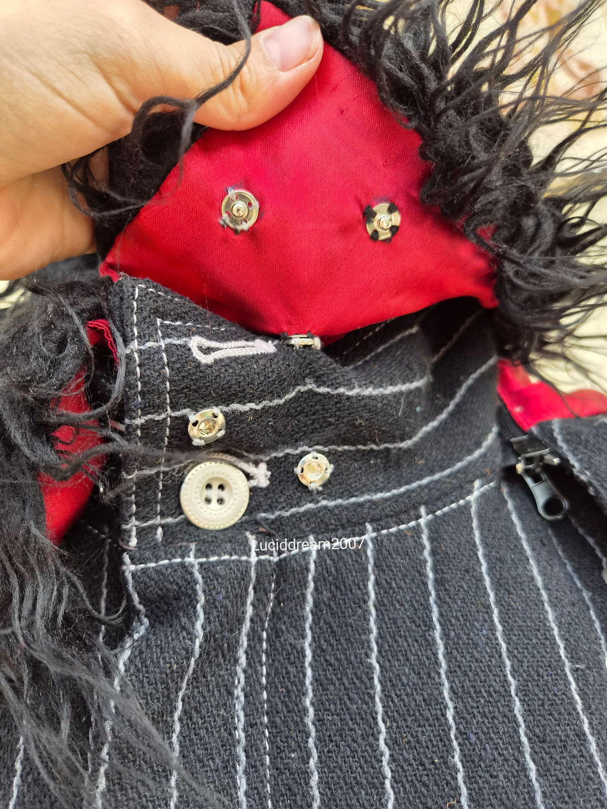 Manteau rayé à sangles
