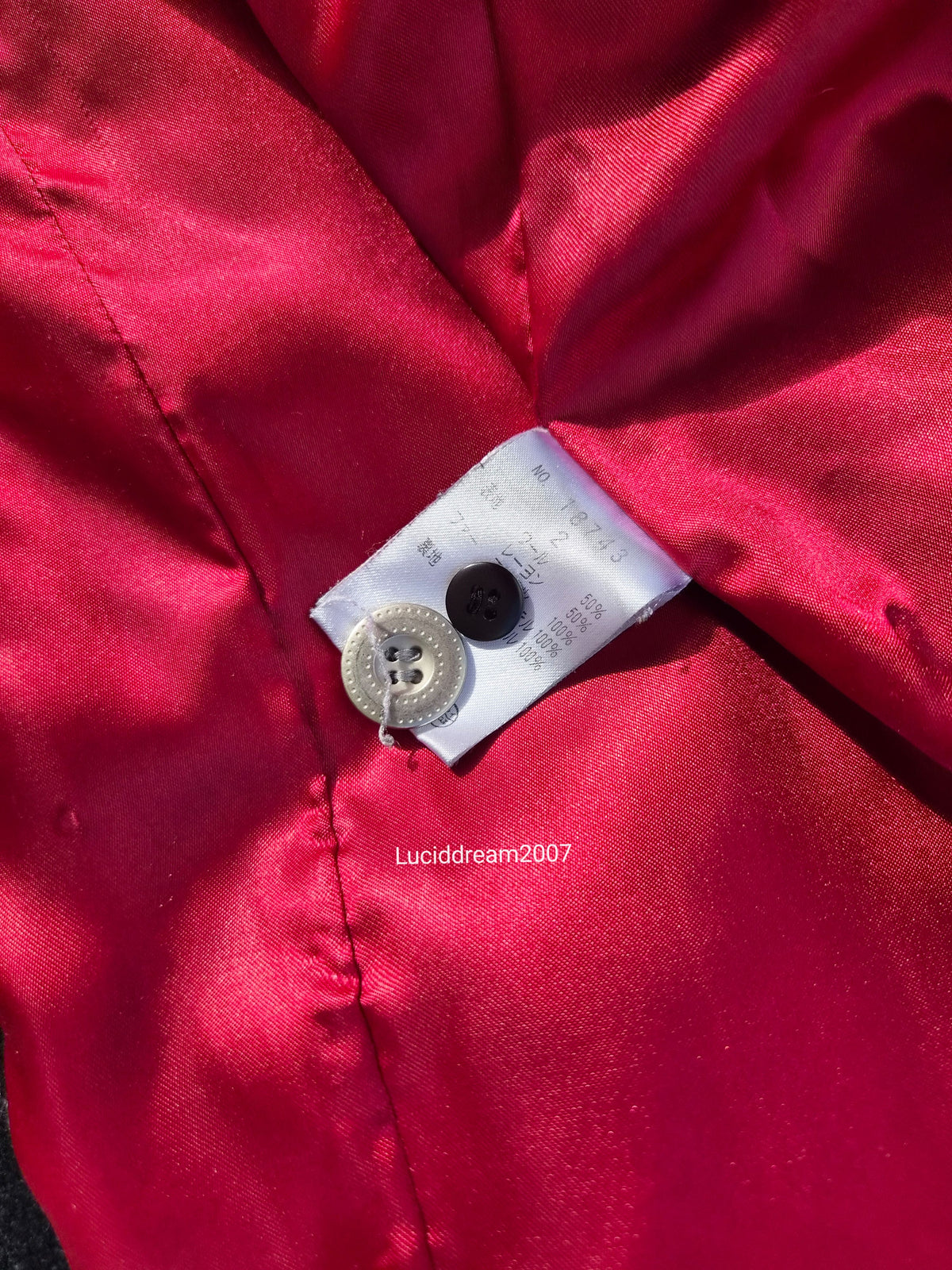 Manteau rayé à sangles