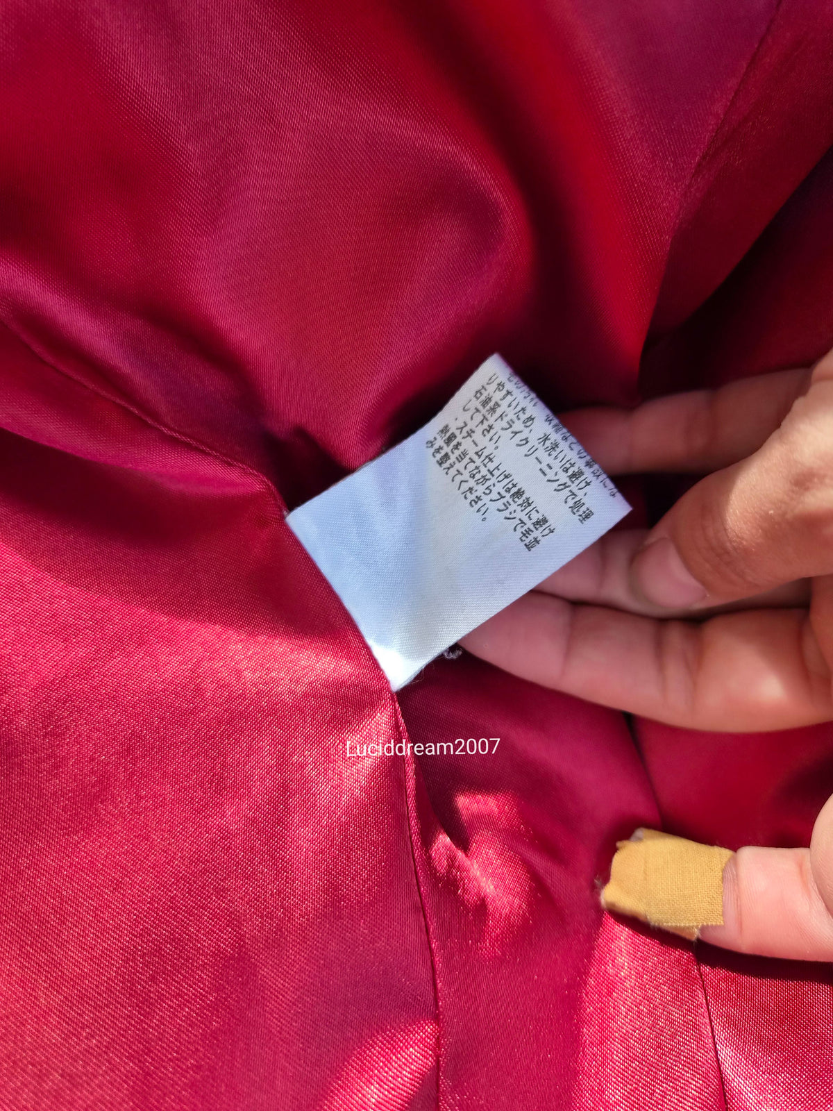 Manteau rayé à sangles
