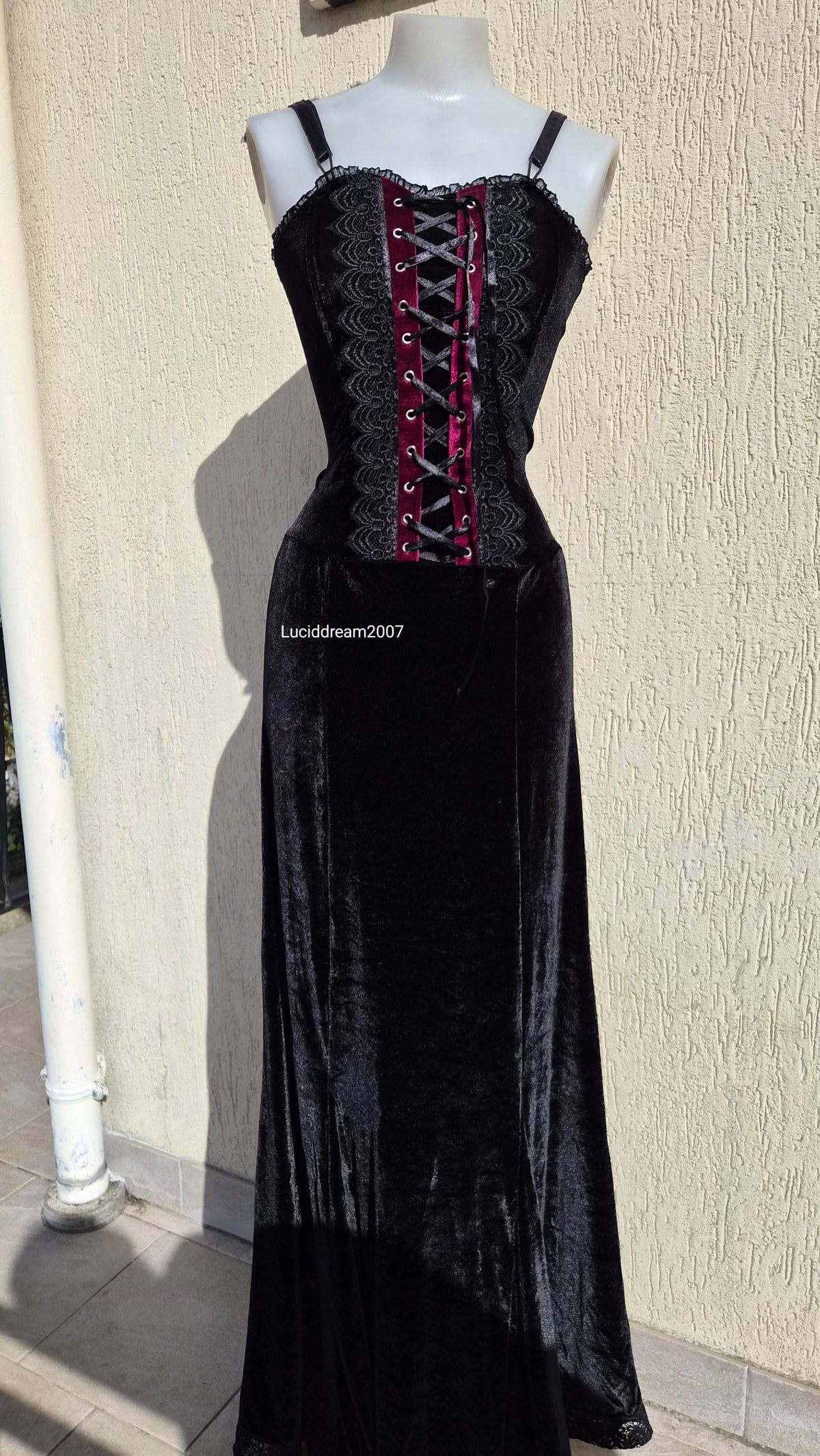 Black velvet dress with lace-up details