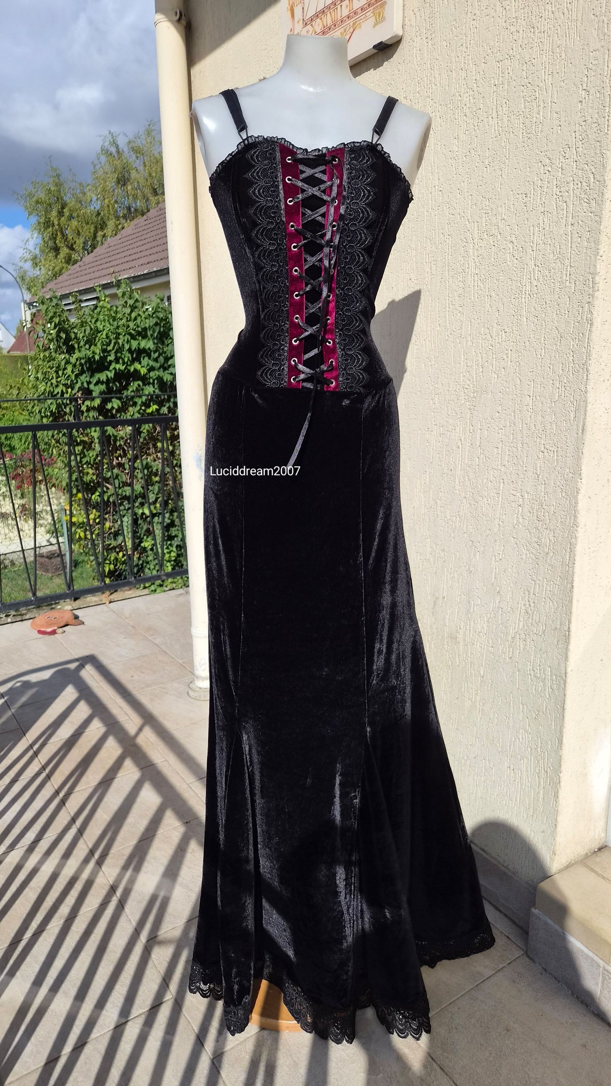 Black velvet dress with lace-up details