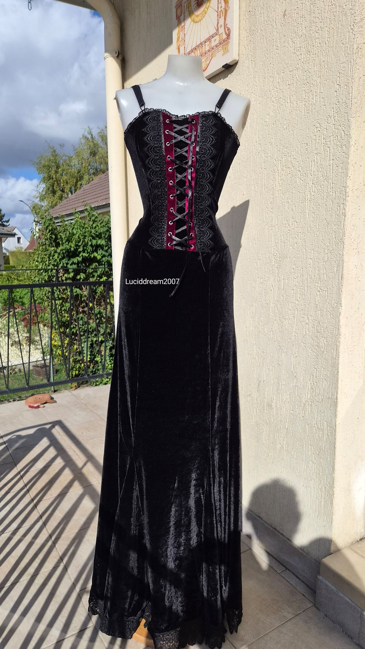 Black velvet dress with lace-up details