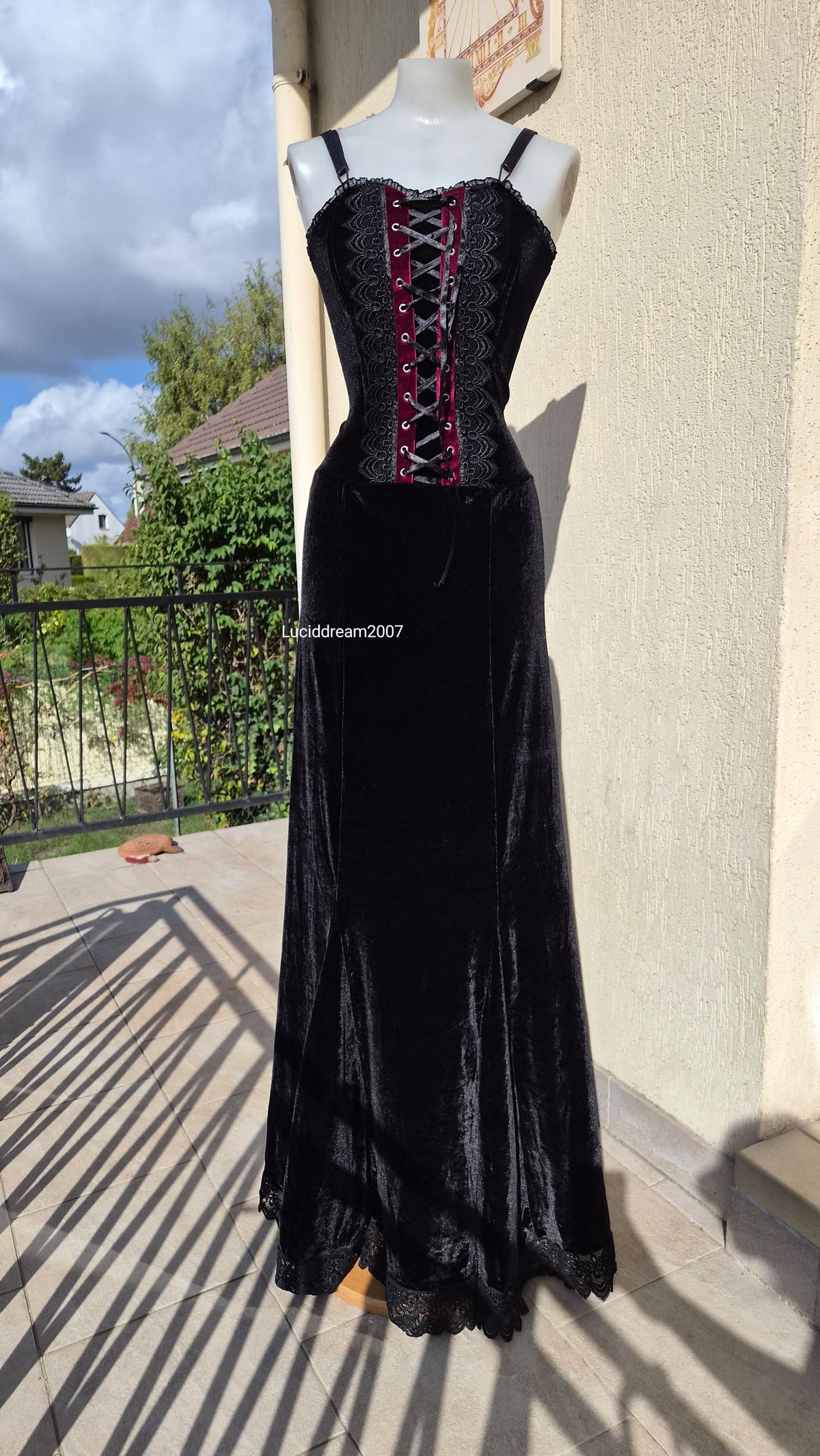 Black velvet dress with lace-up details