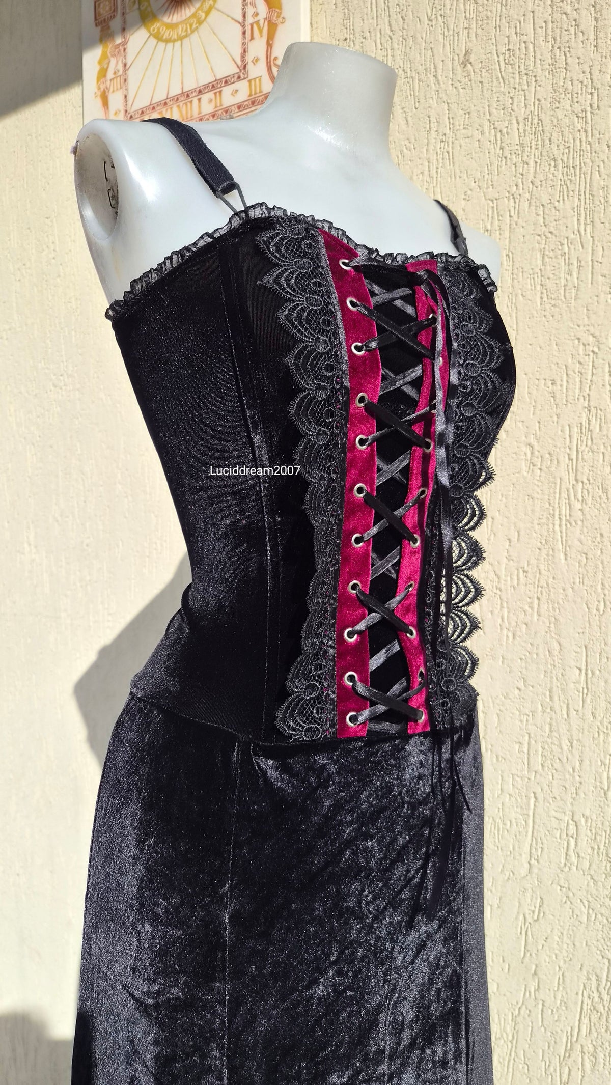 Black velvet dress with lace-up details