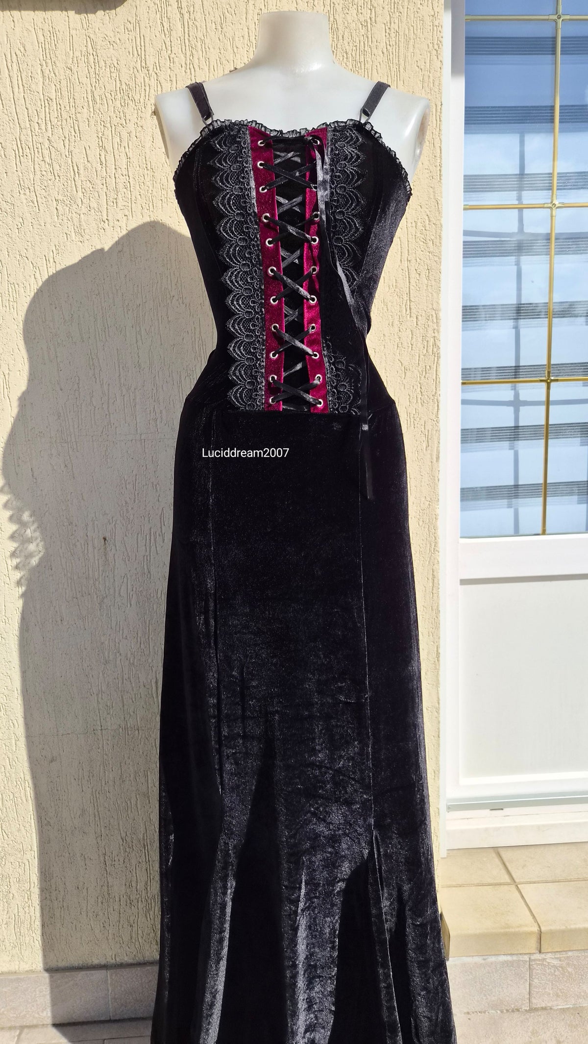 Black velvet dress with lace-up details