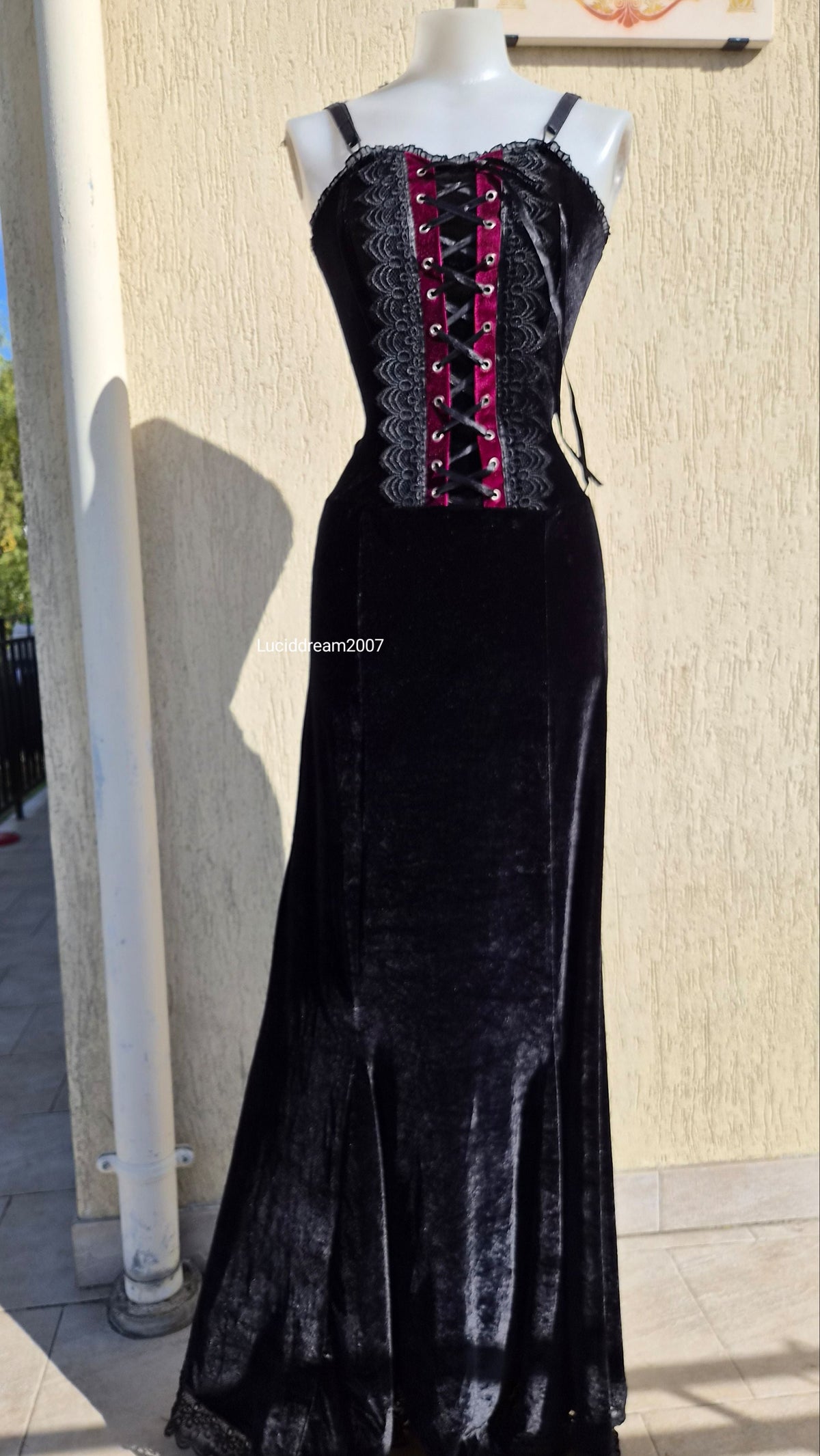 Black velvet dress with lace-up details