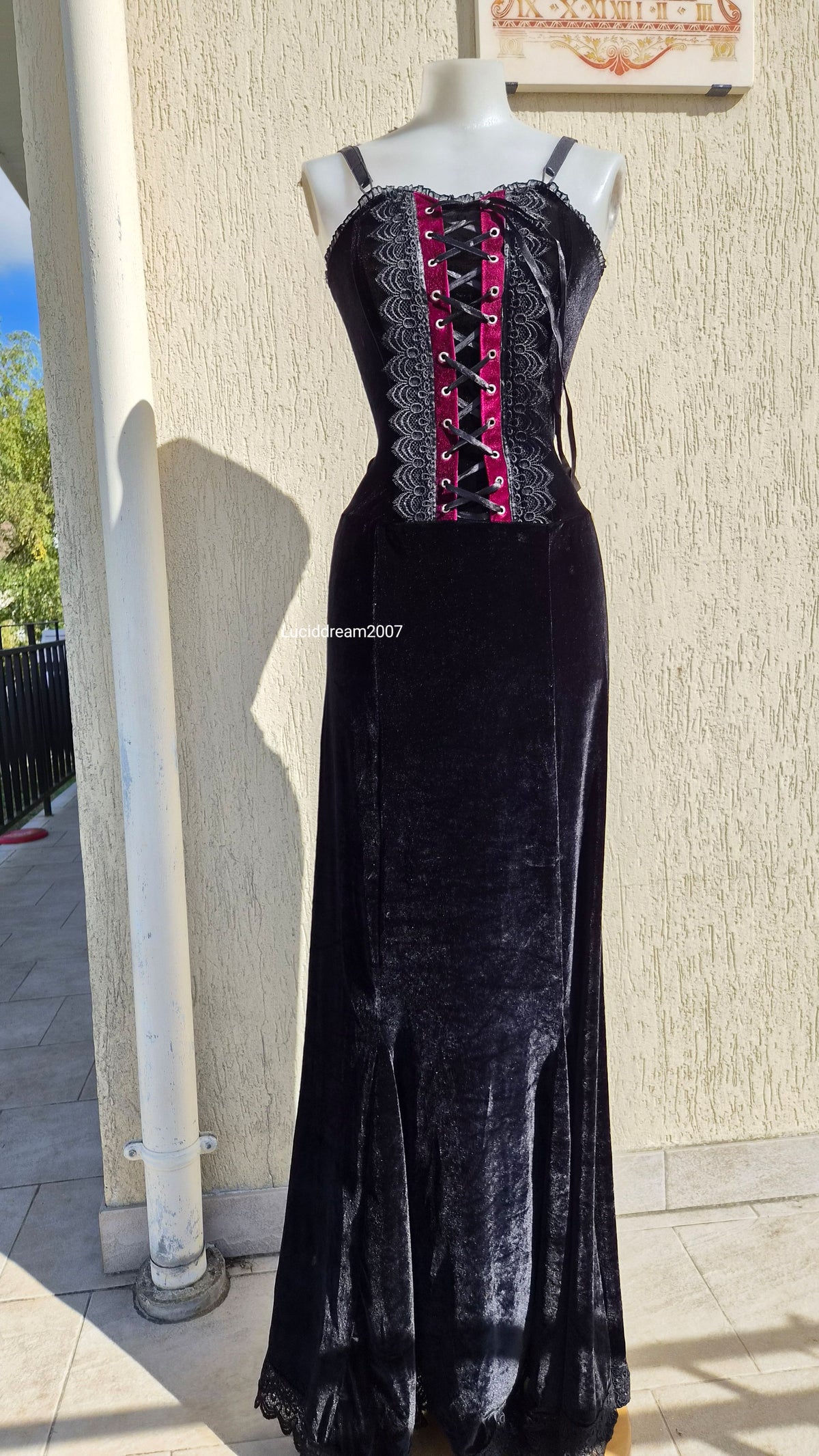 Black velvet dress with lace-up details