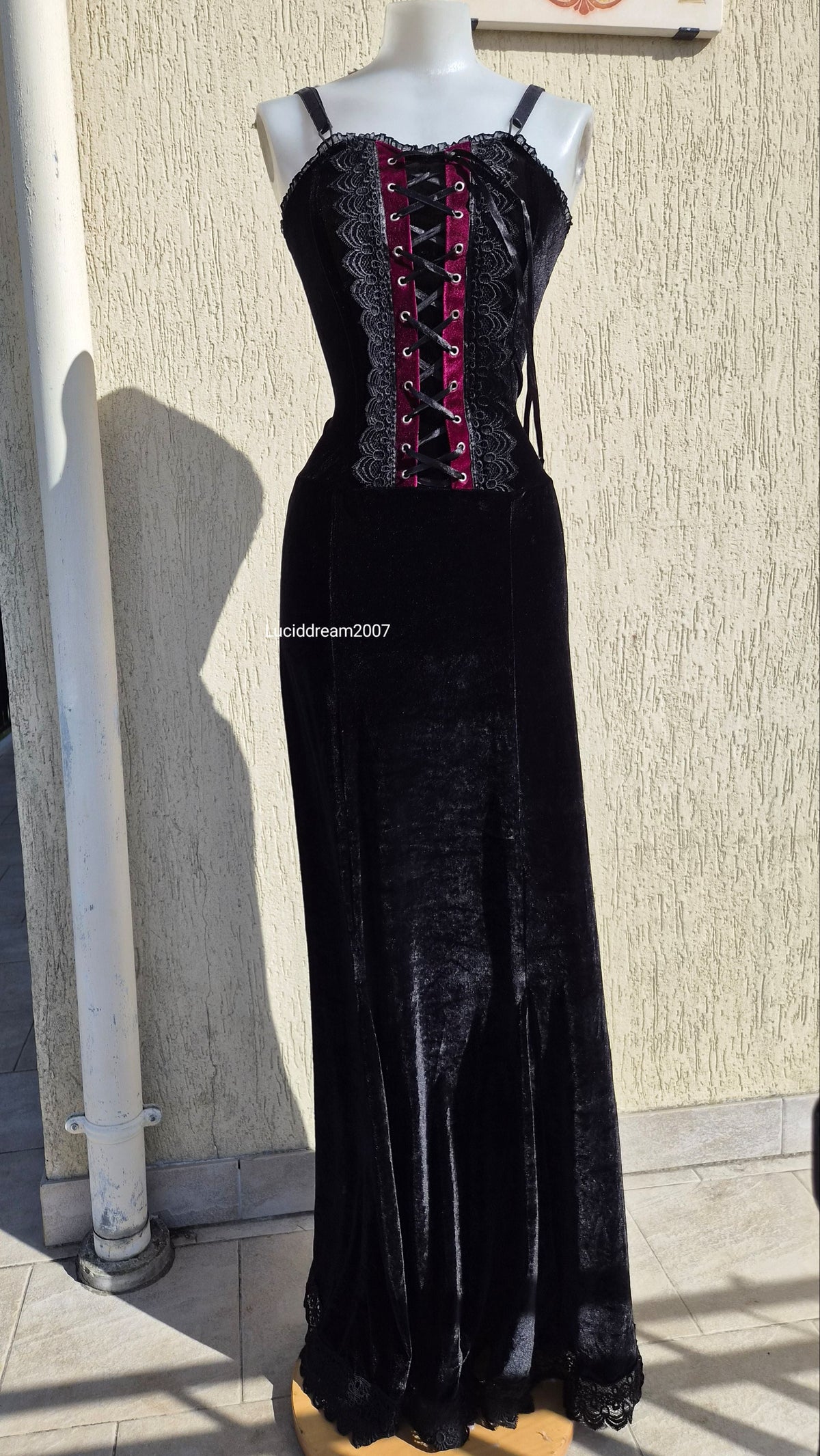 Black velvet dress with lace-up details