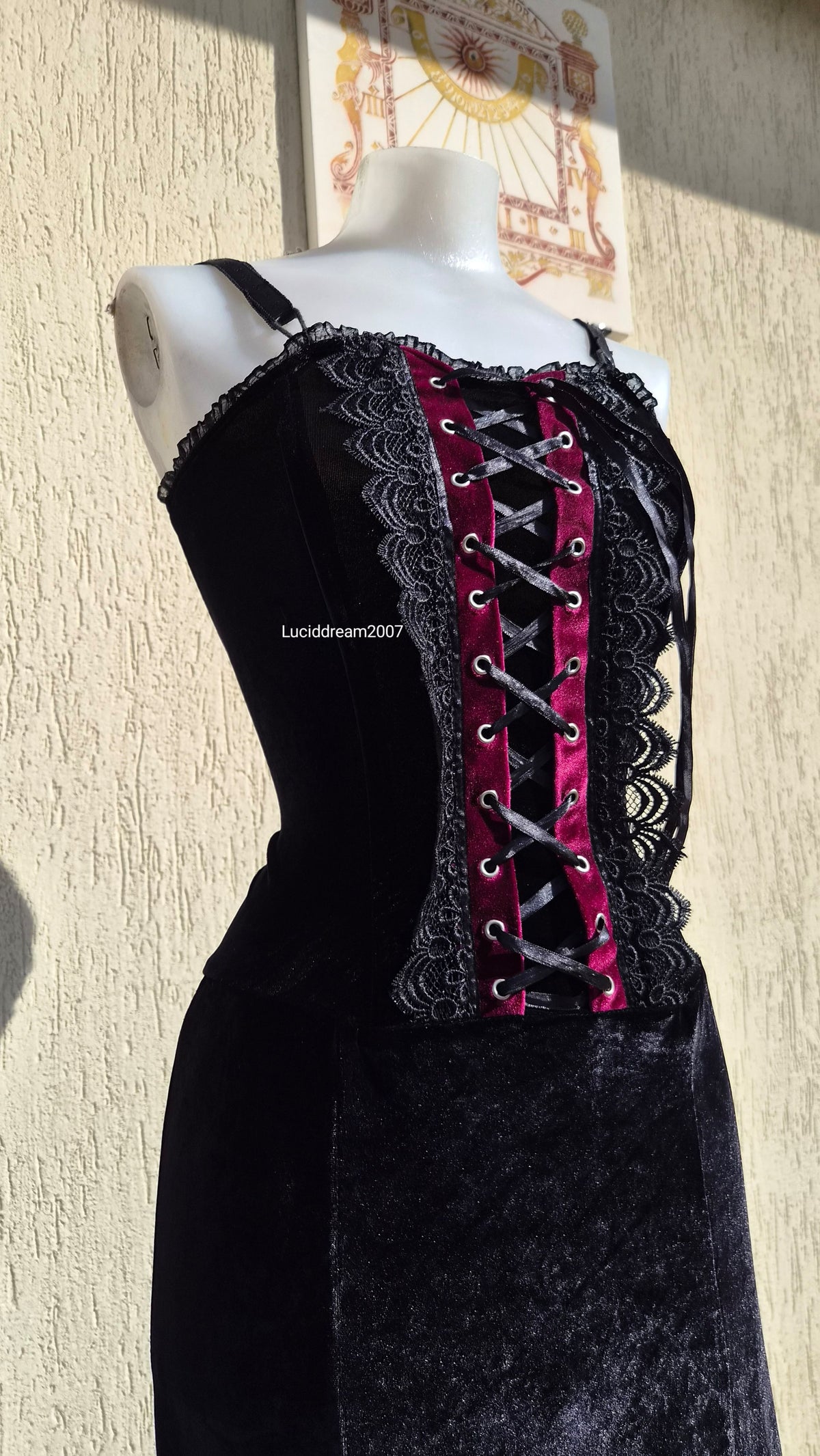 Black velvet dress with lace-up details