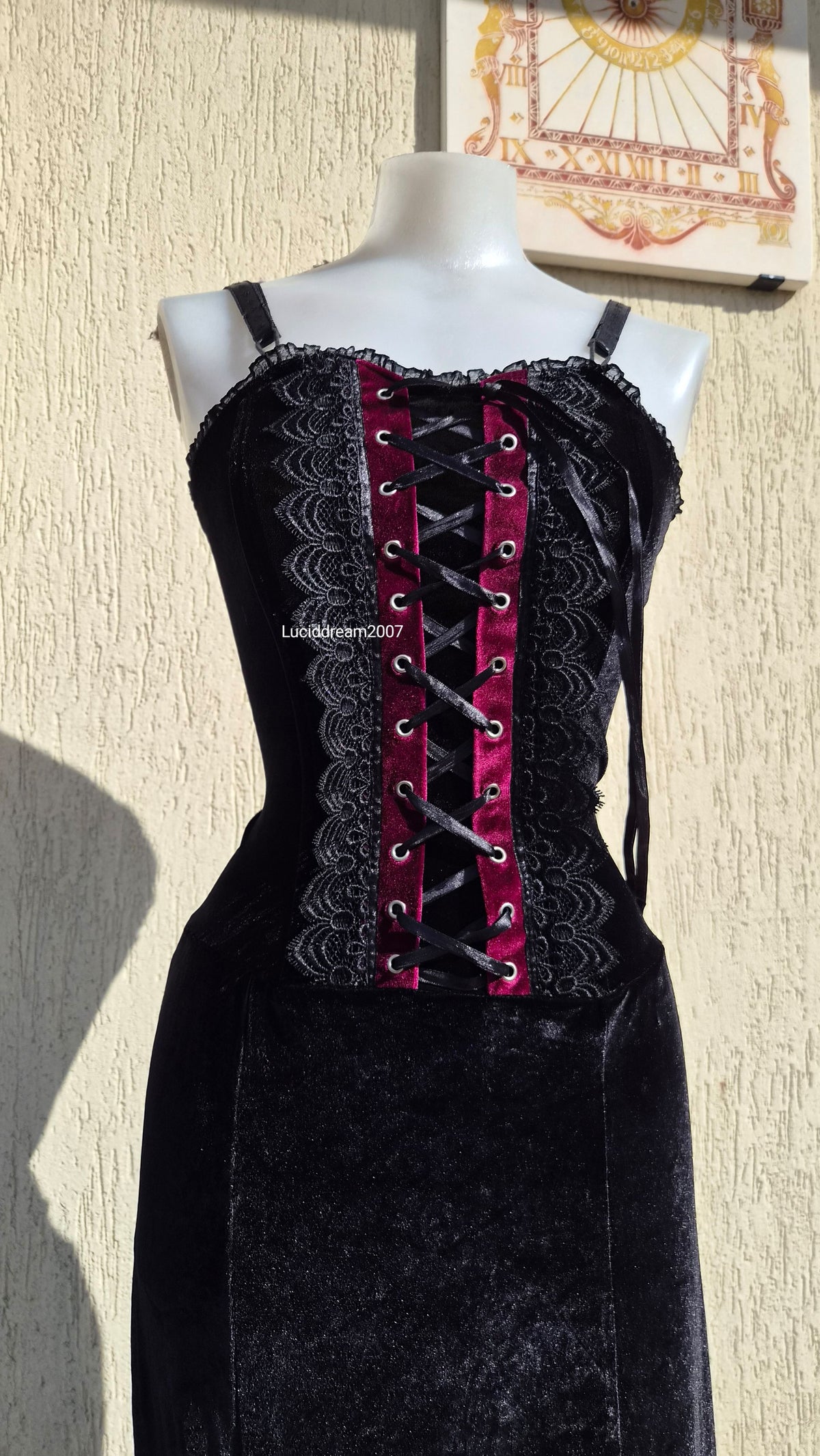 Black velvet dress with lace-up details