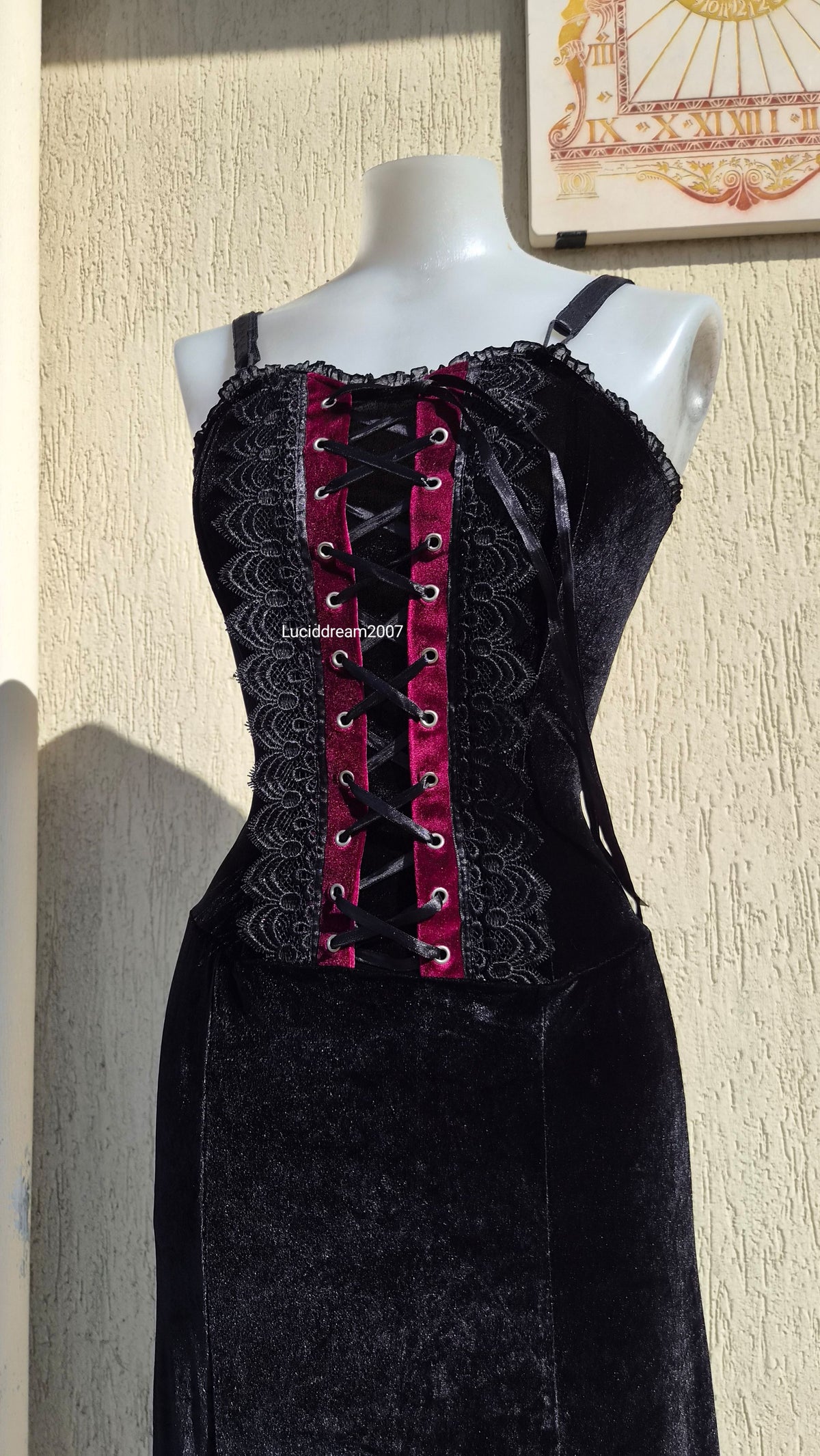 Black velvet dress with lace-up details