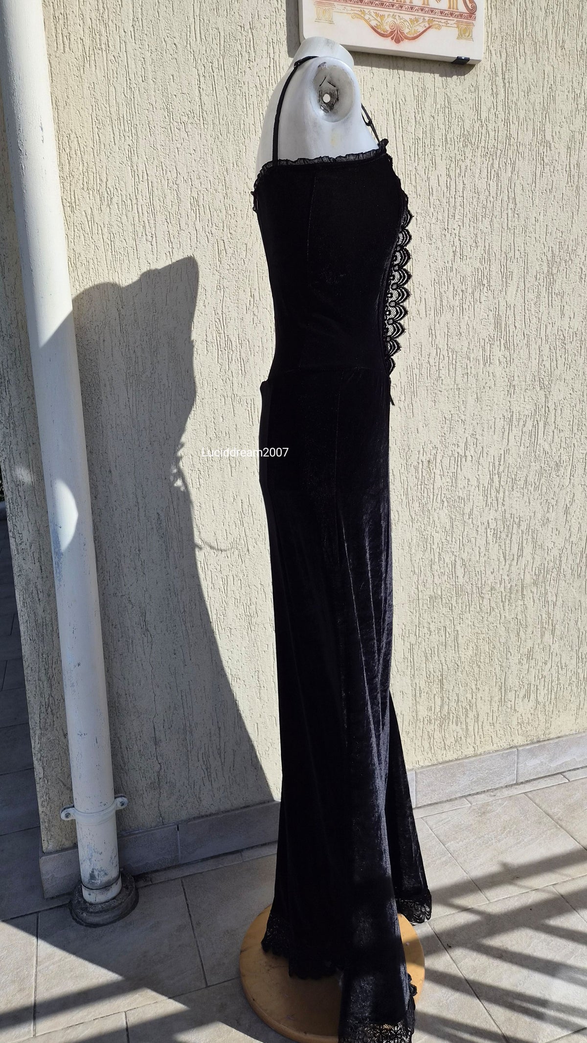 Black velvet dress with lace-up details