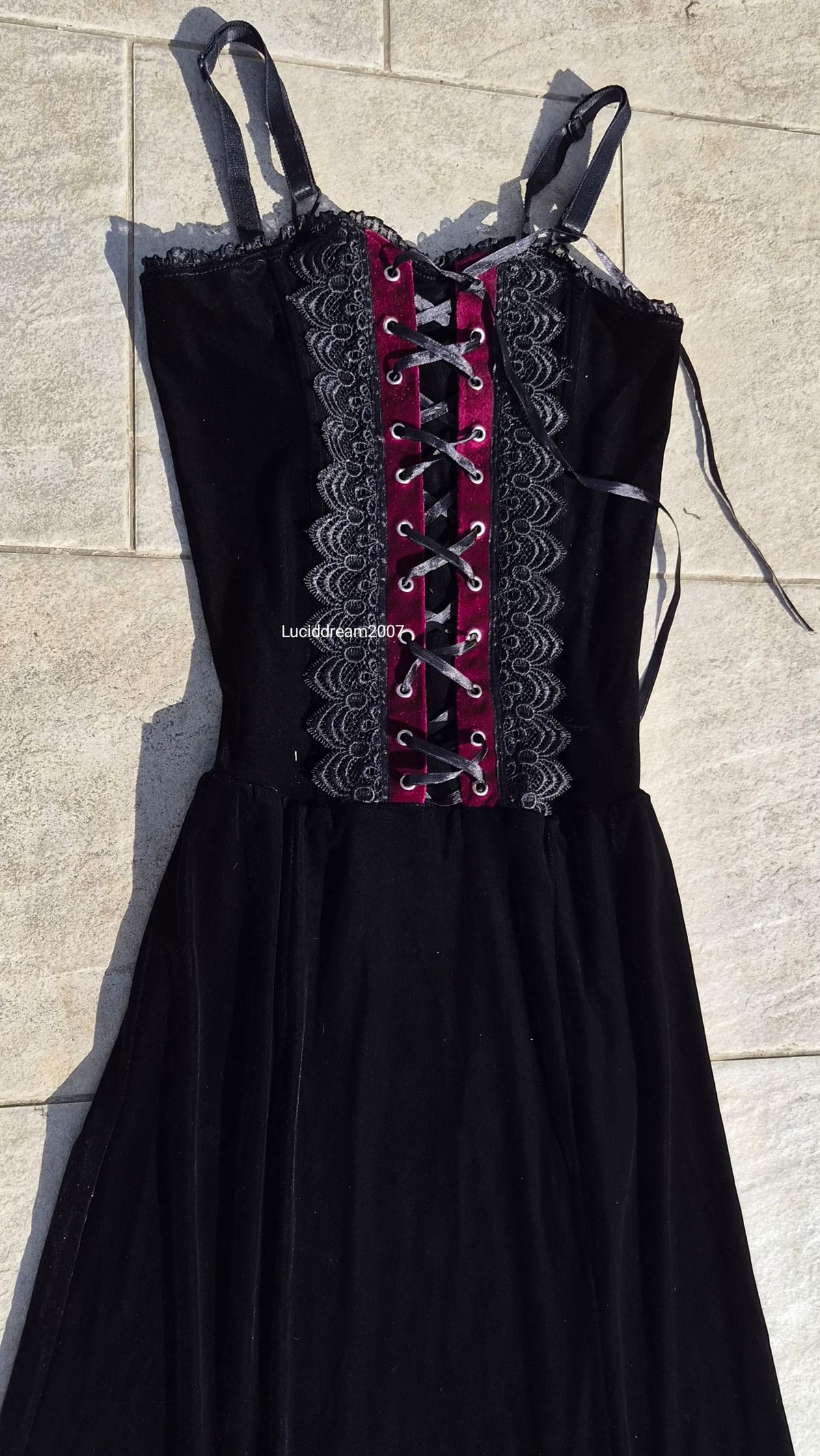 Black velvet dress with lace-up details