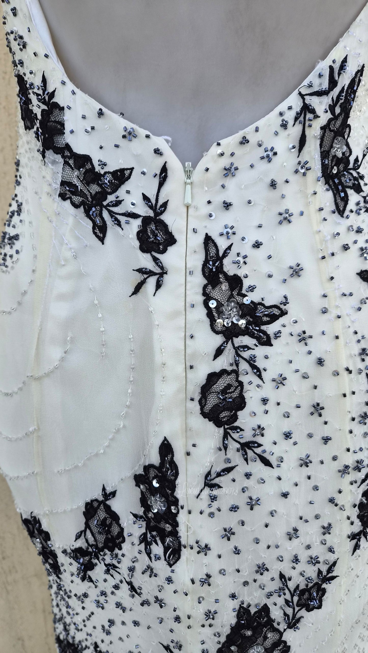 White and black embroidered silk dress