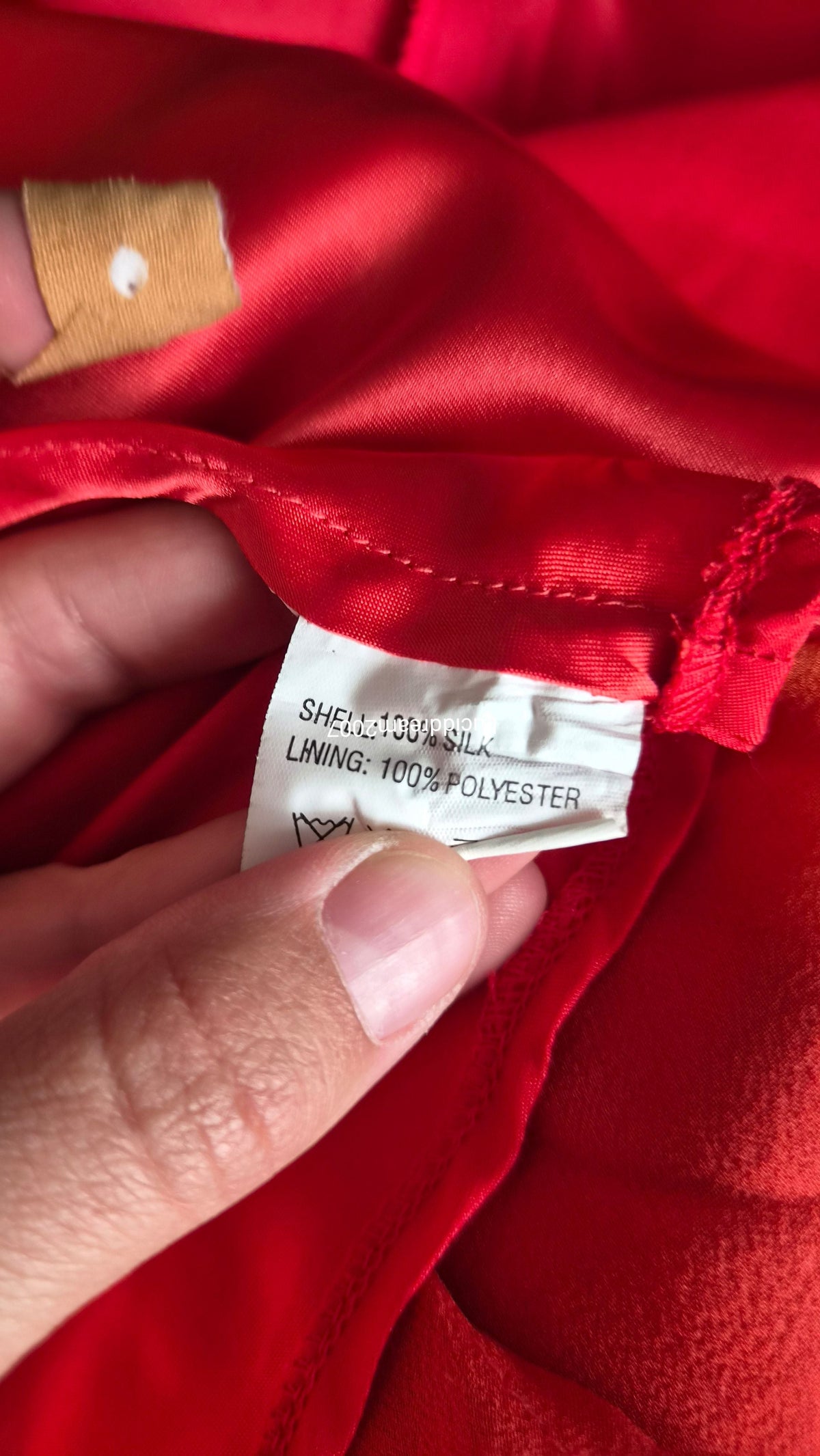 Embroidered orange silk dress