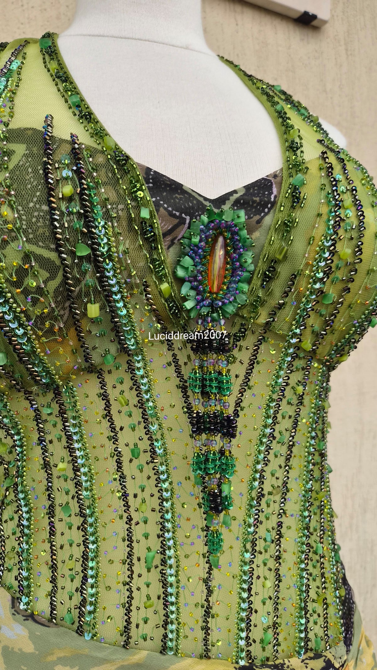 Embroidered silk green dress