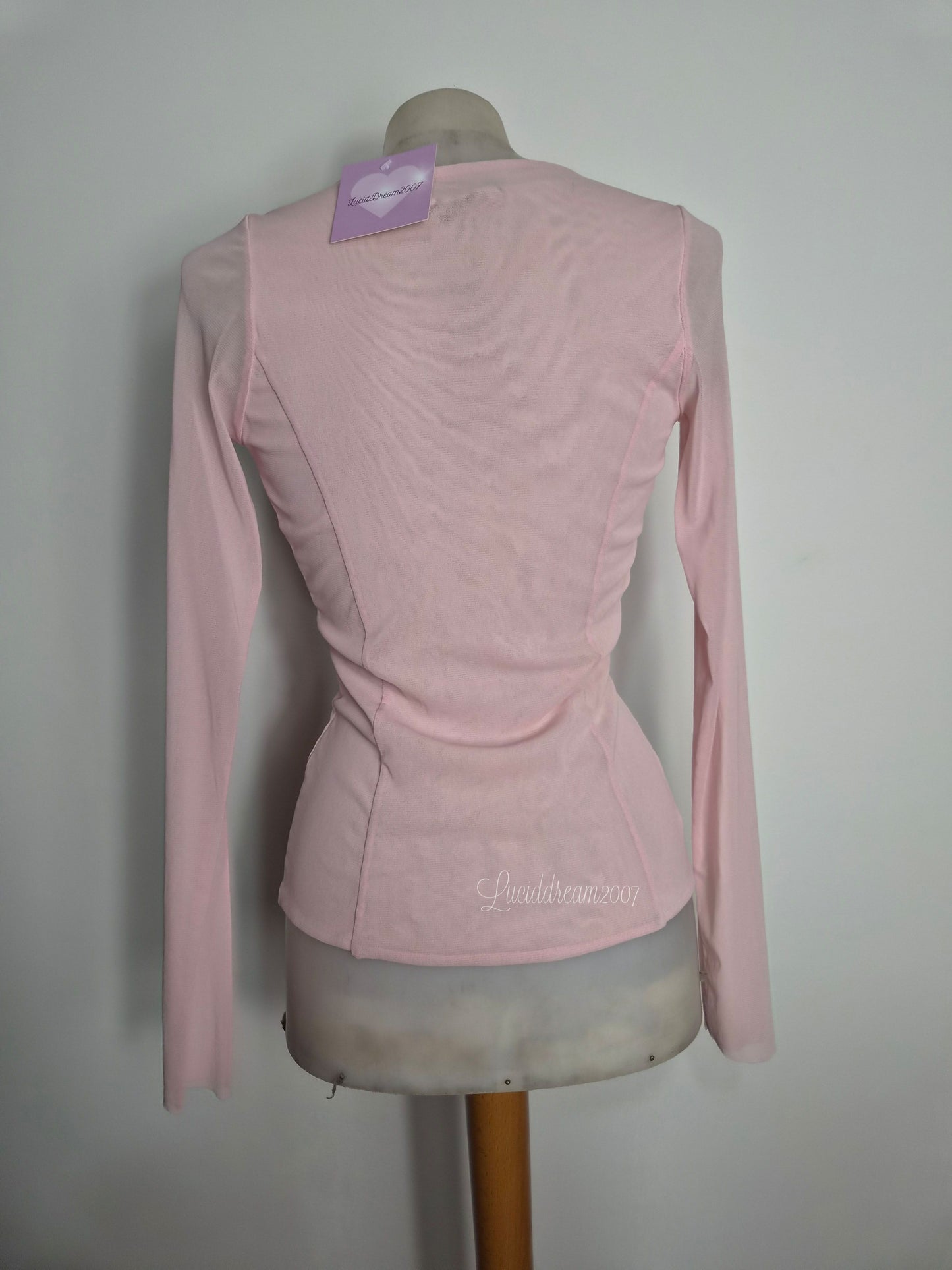Haut bi matière rose poudré