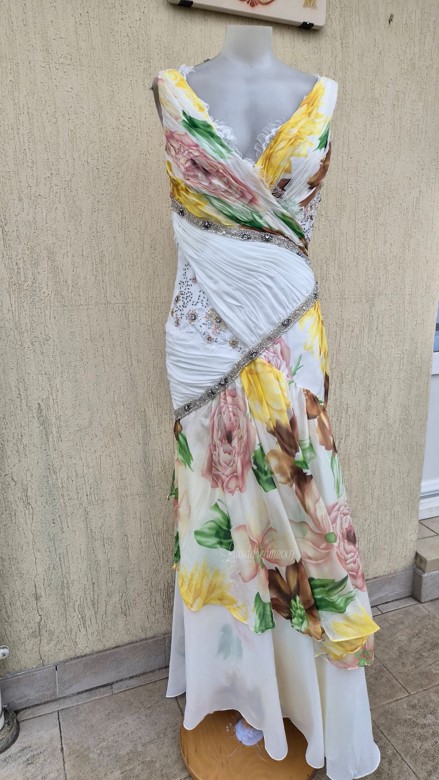 White dress with floral details and embroidery