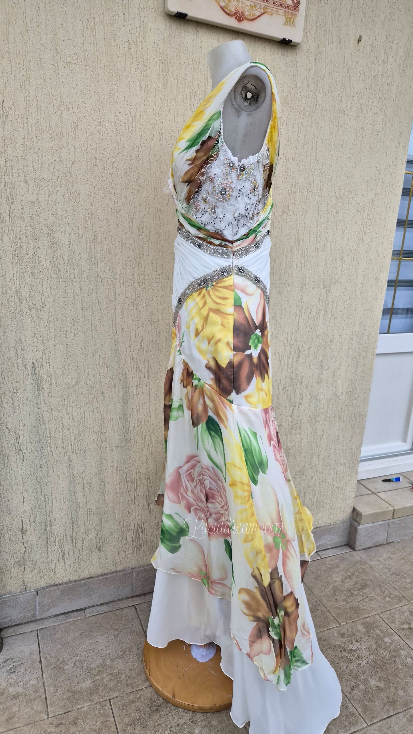 White dress with floral details and embroidery