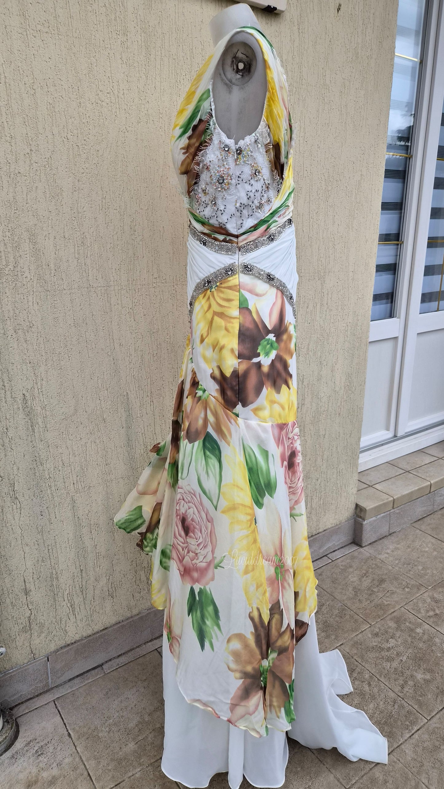 White dress with floral details and embroidery
