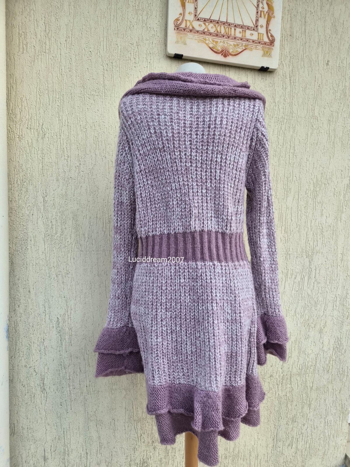 Cardigan en tricot lila et rose pâle