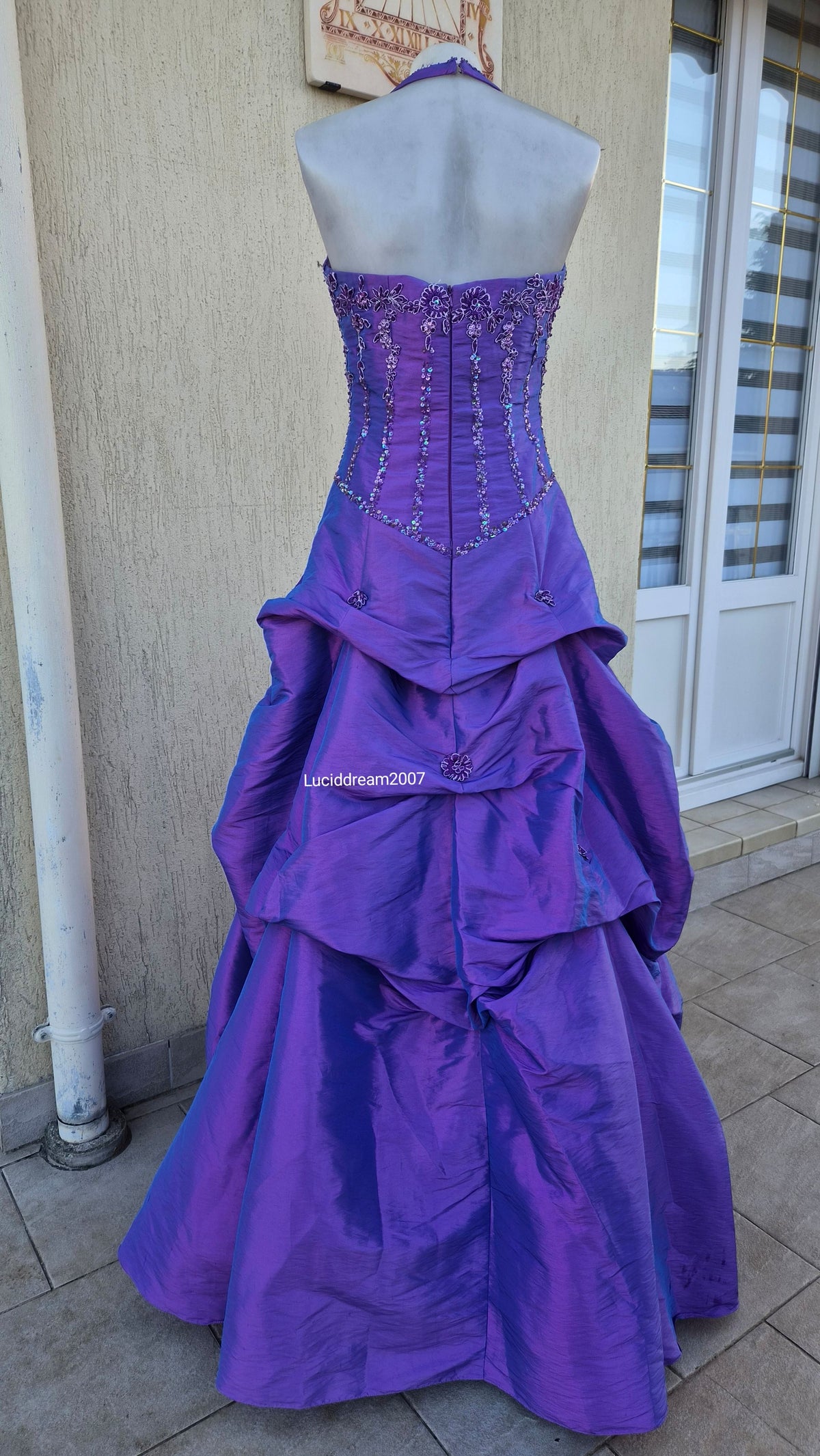 Purple ball gown with embroidery