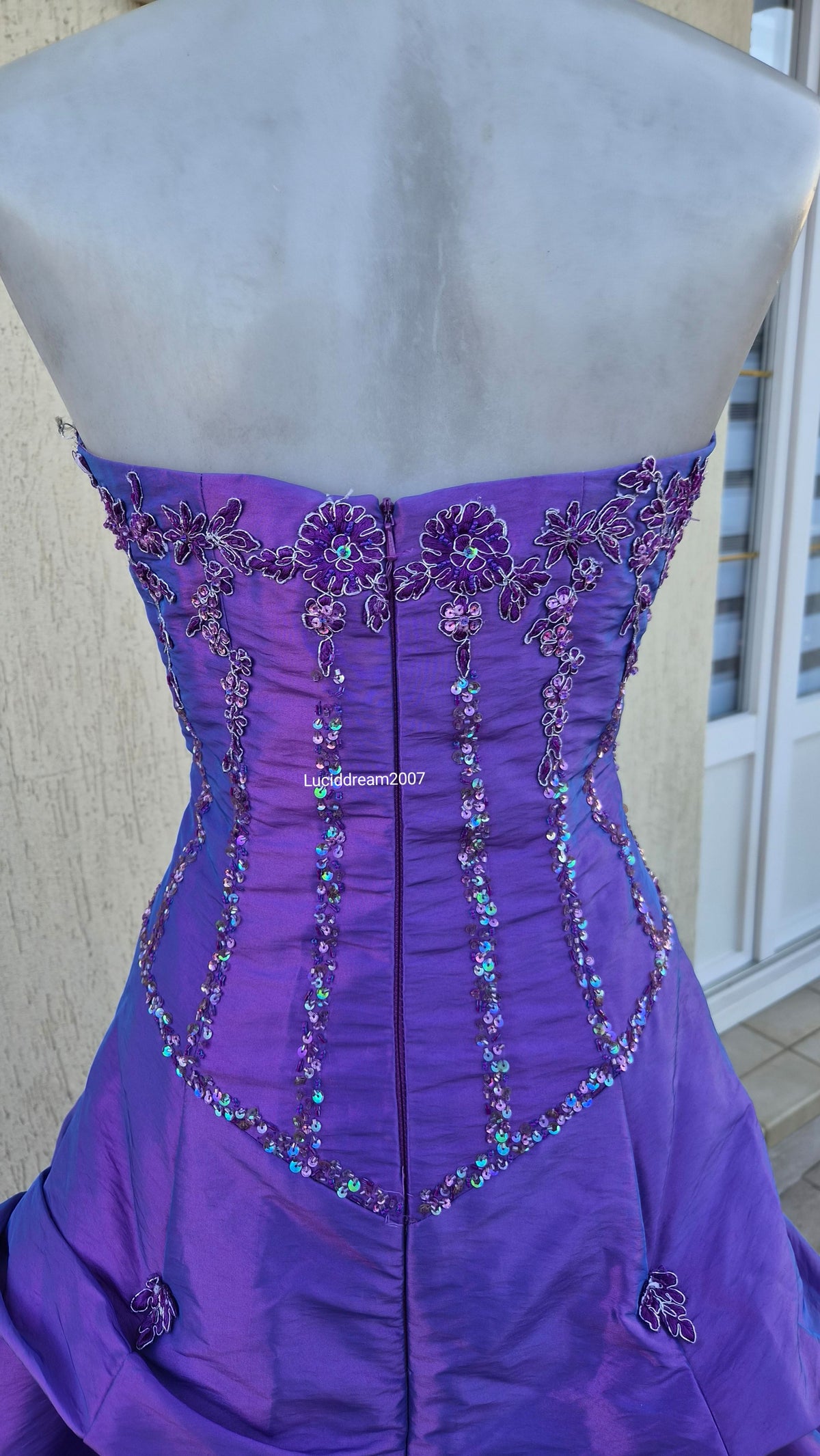 Purple ball gown with embroidery