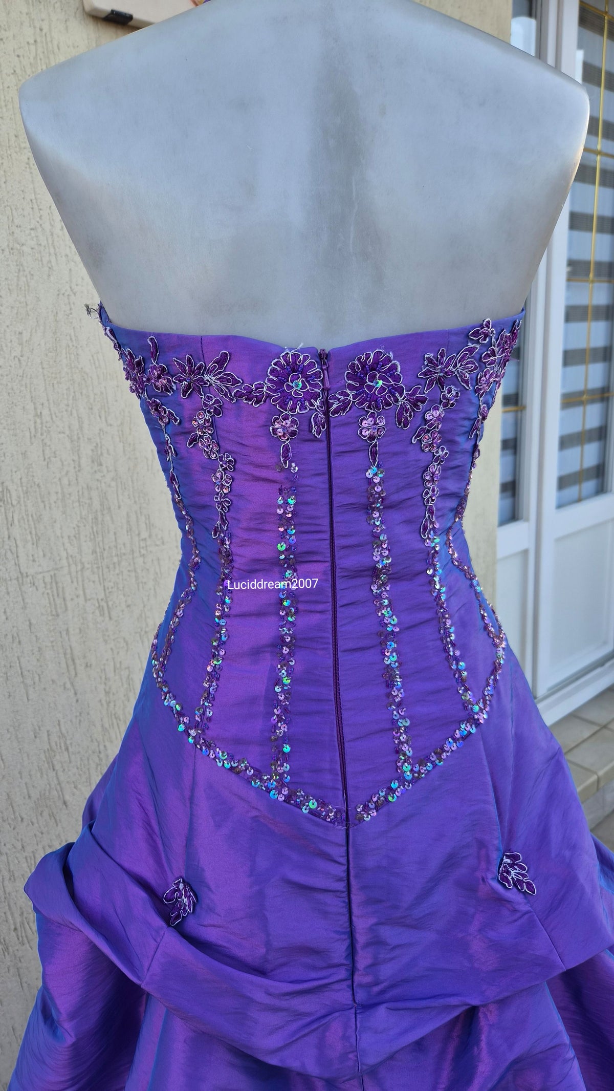 Purple ball gown with embroidery
