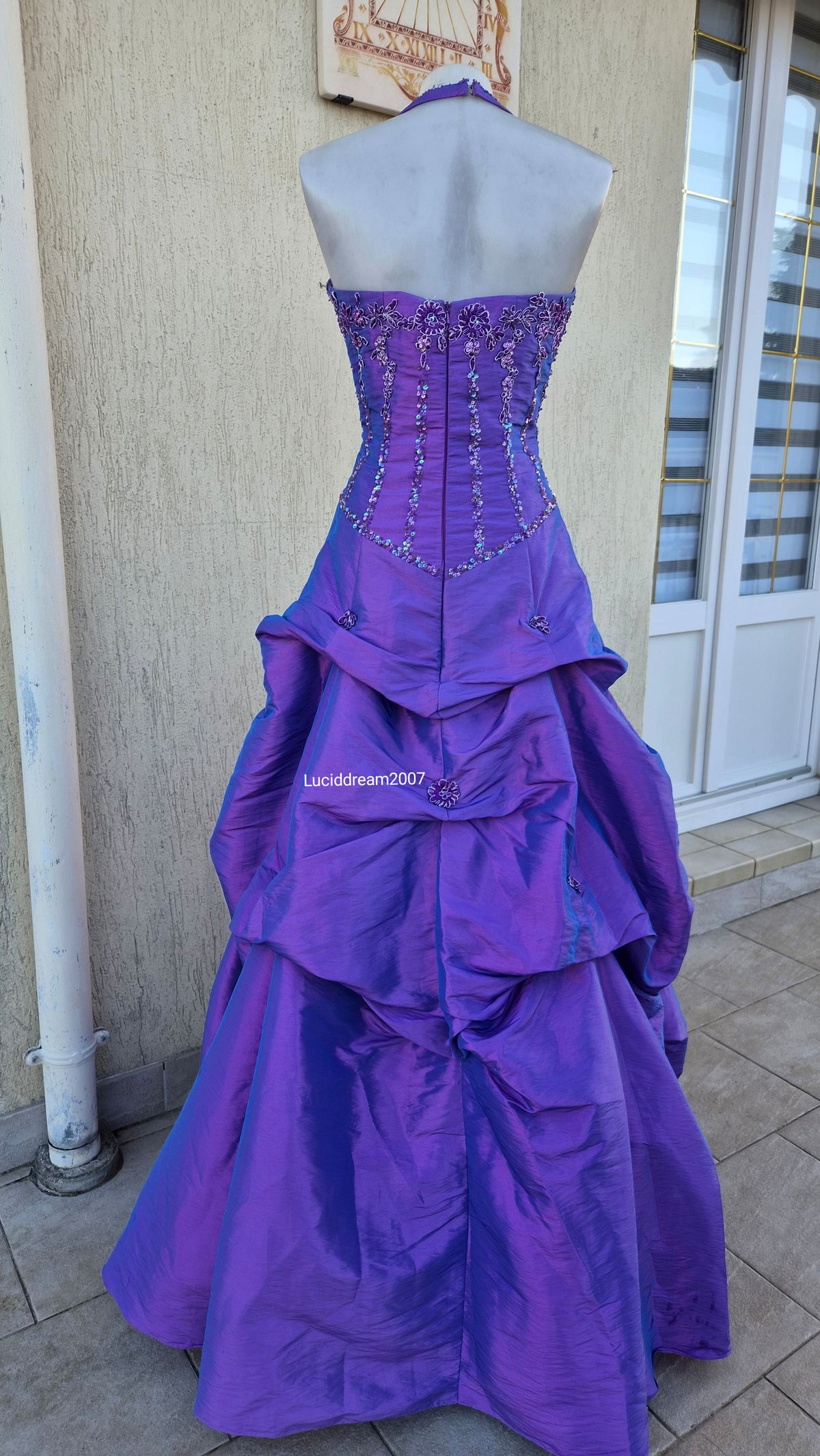Purple ball gown with embroidery
