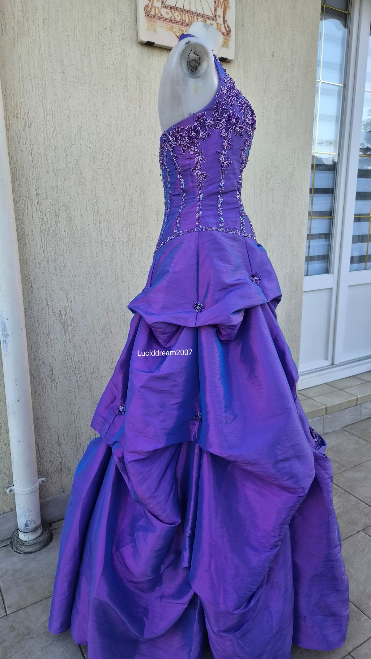 Purple ball gown with embroidery