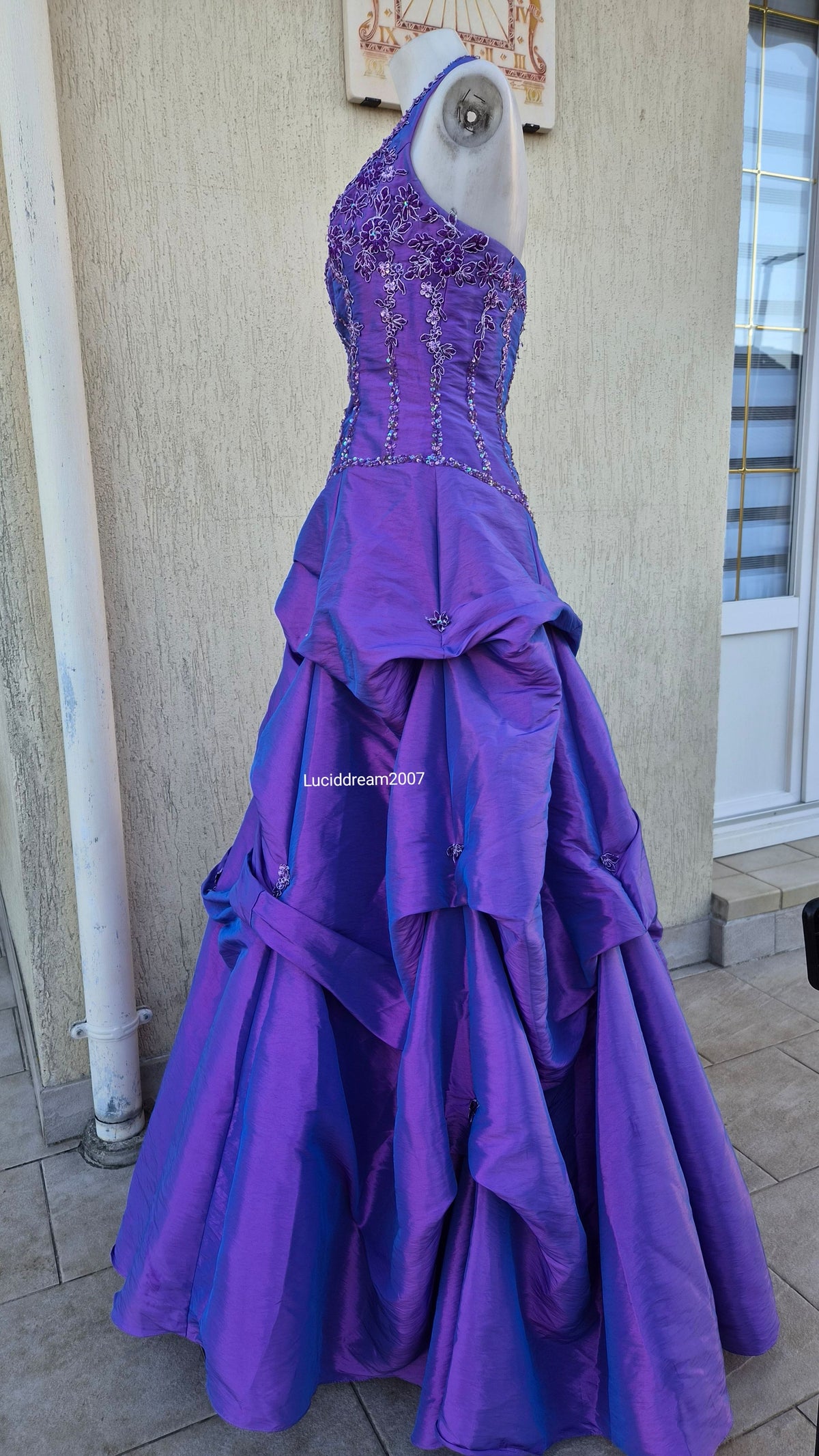 Purple ball gown with embroidery