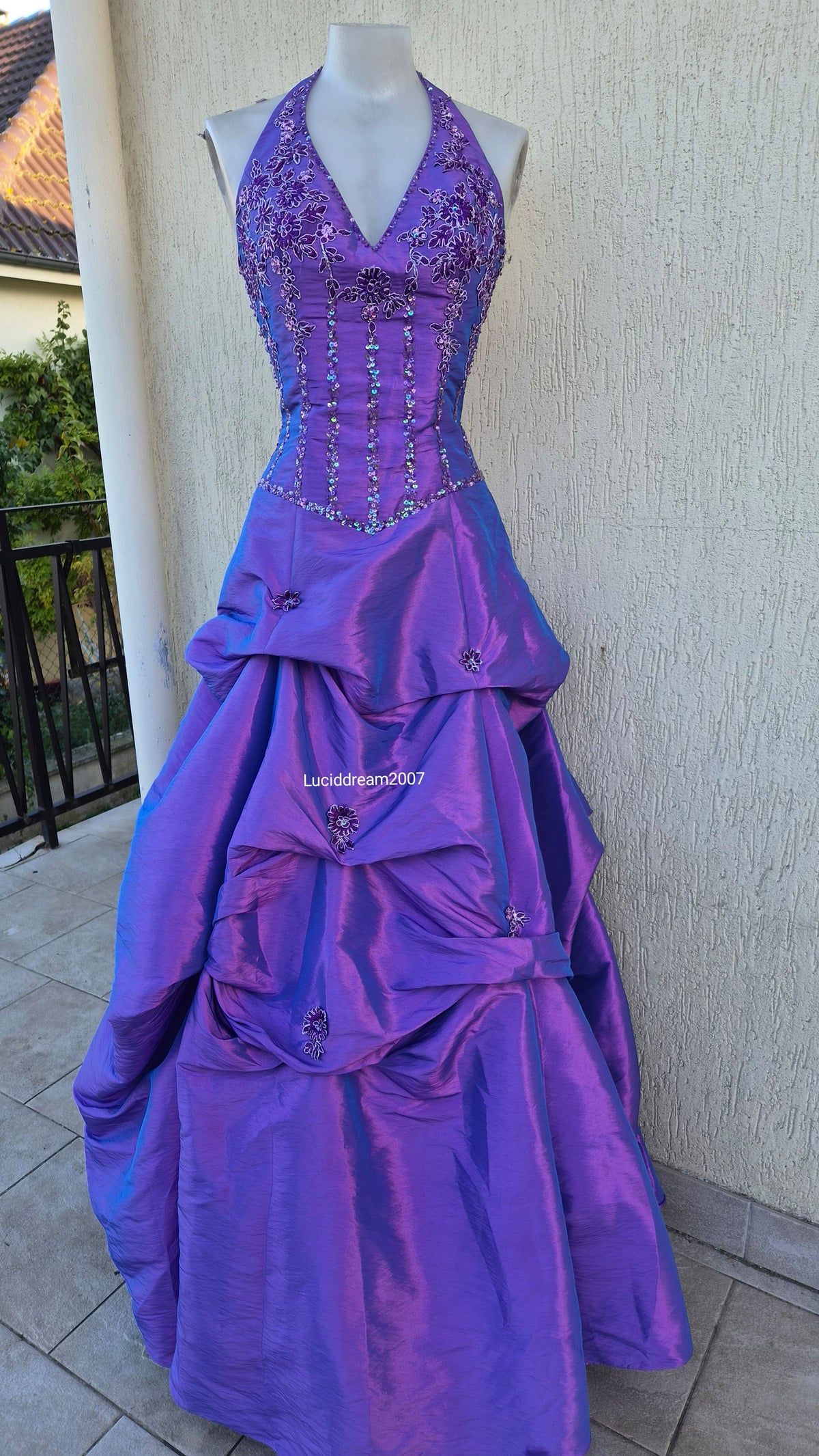 Purple ball gown with embroidery