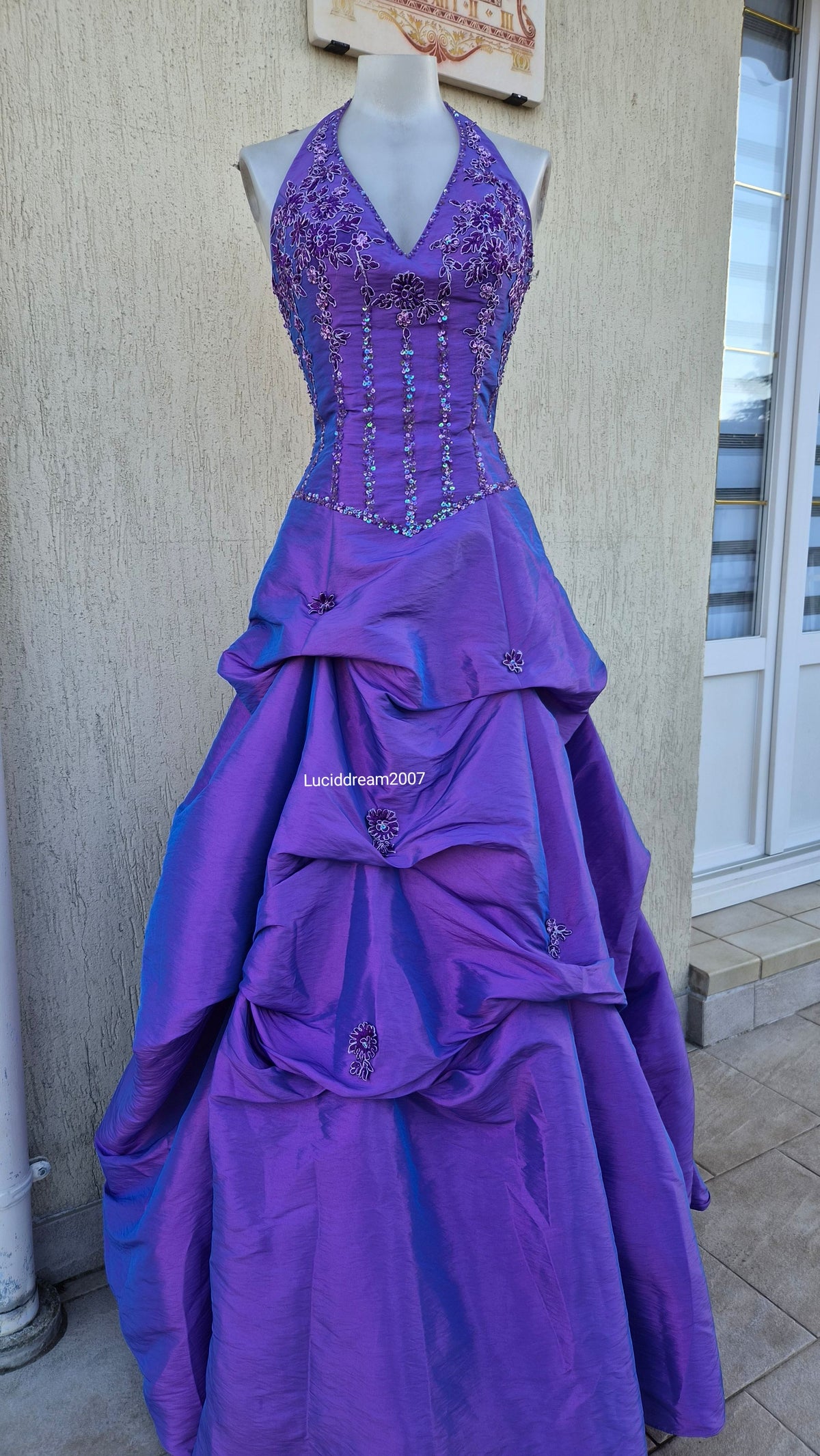 Purple ball gown with embroidery