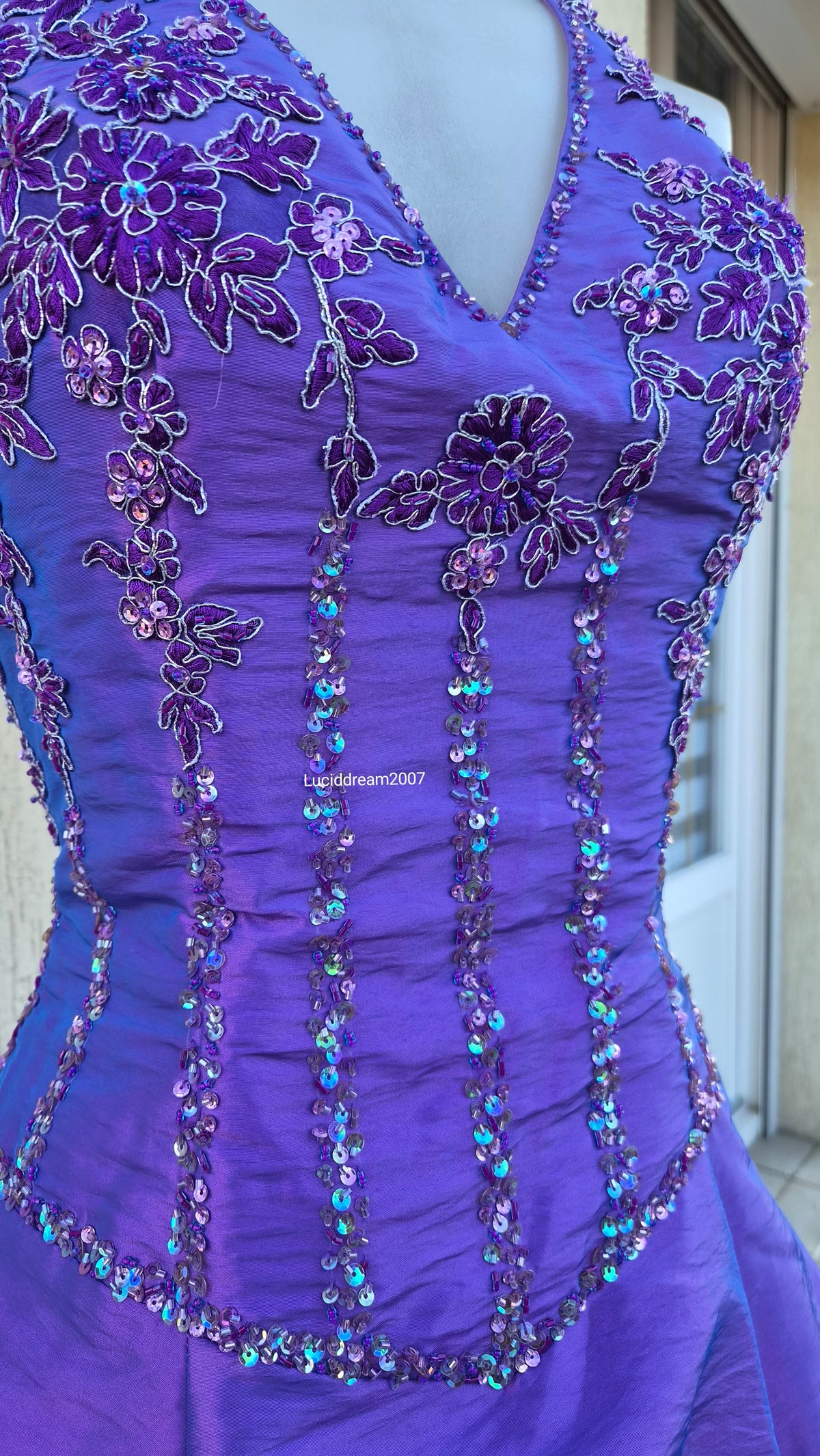 Purple ball gown with embroidery