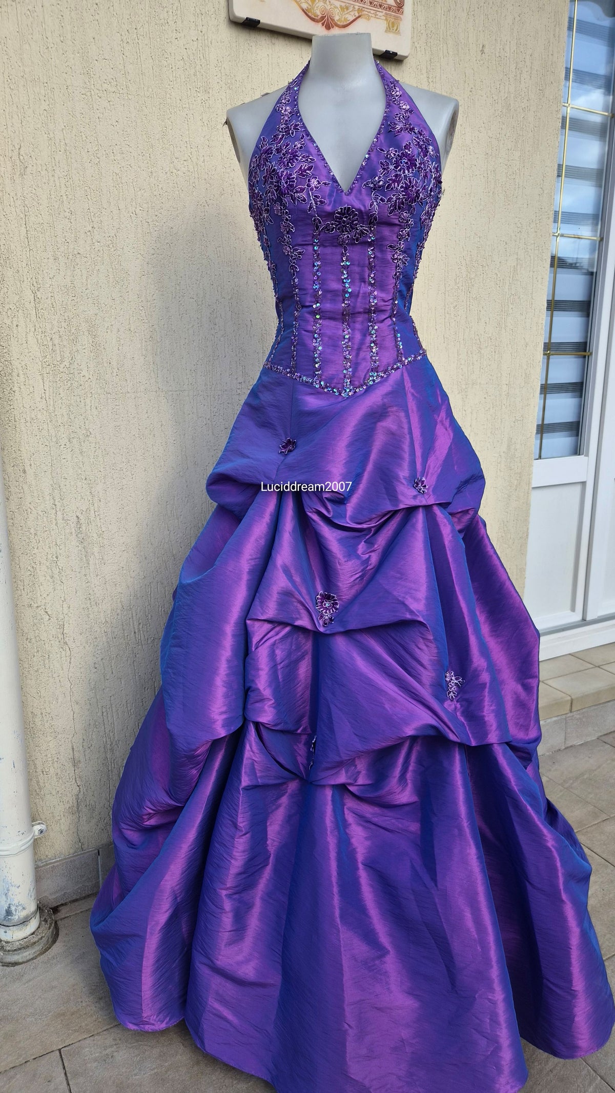 Purple ball gown with embroidery