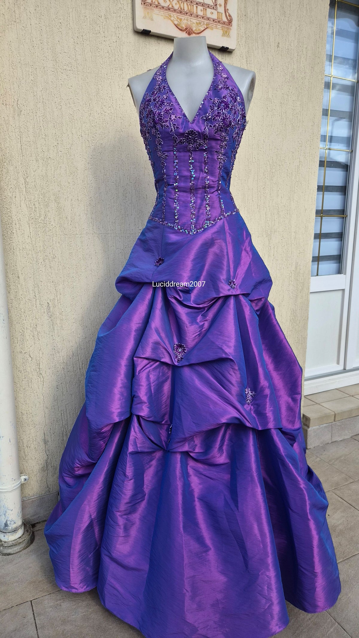 Purple ball gown with embroidery