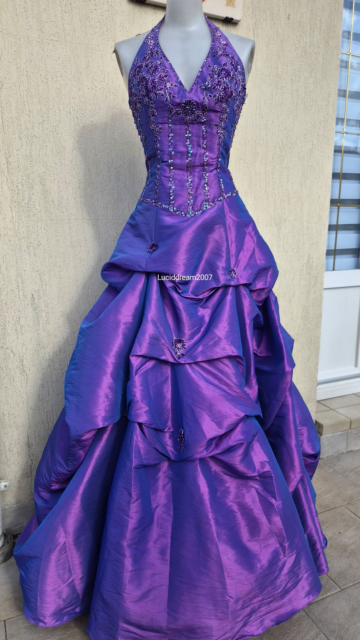 Purple ball gown with embroidery