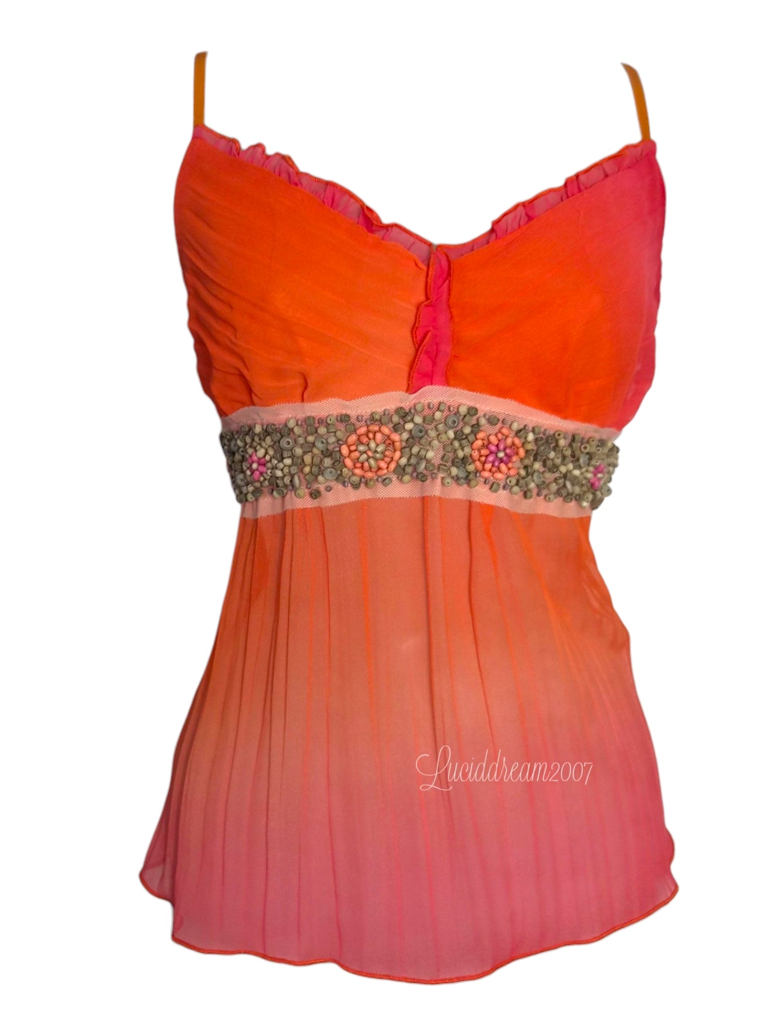 Débardeur Y2K vibrant à dégradé orange et rose avec une taille perlée complexe. Fluide, estival et style fairycore unique. Sorti d'une reverie.
