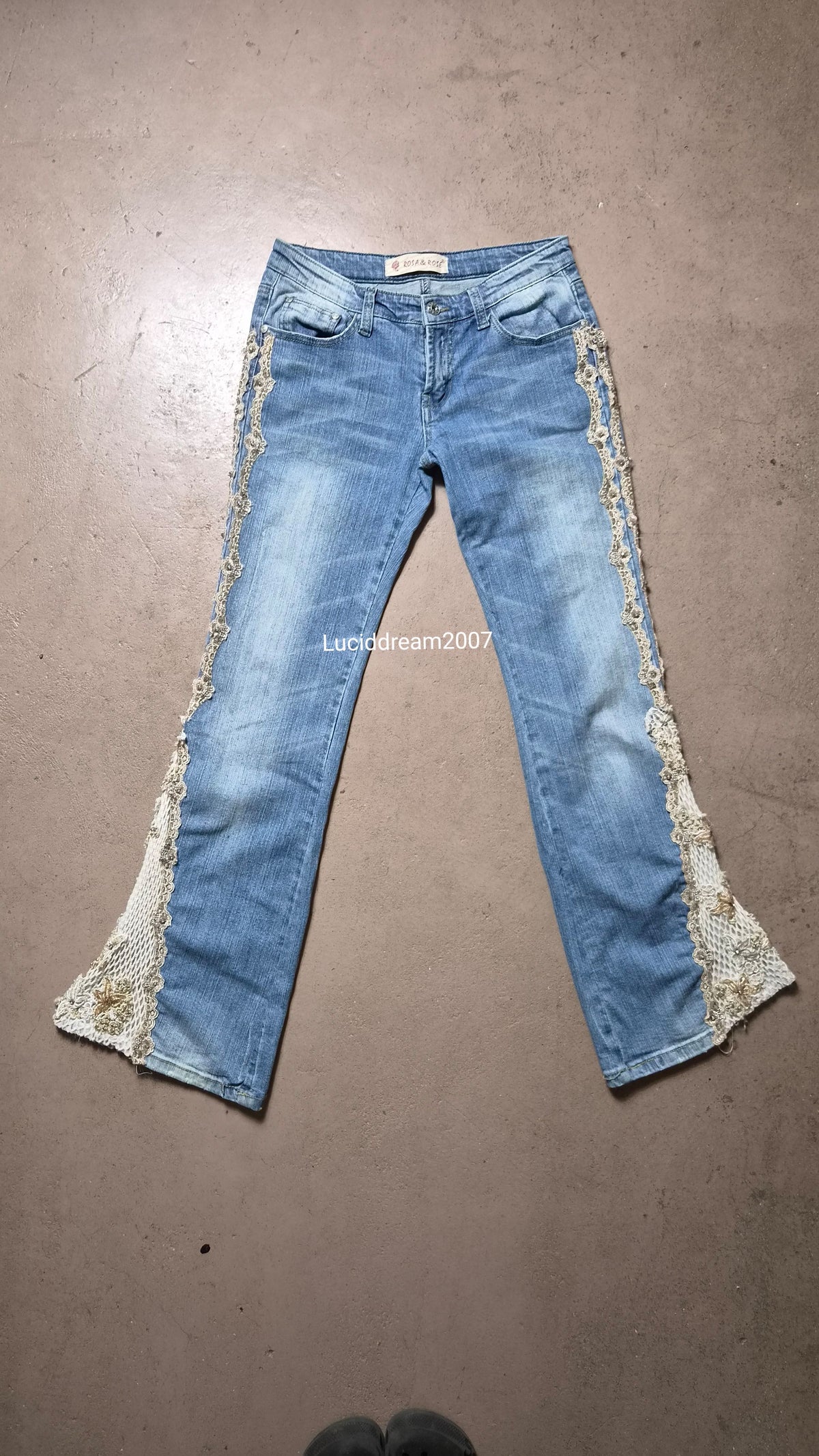 Denim trousers with lace details