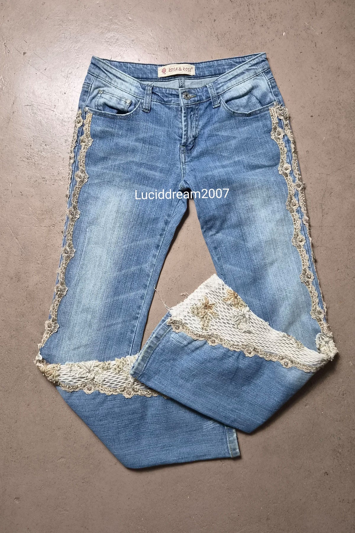 Denim trousers with lace details
