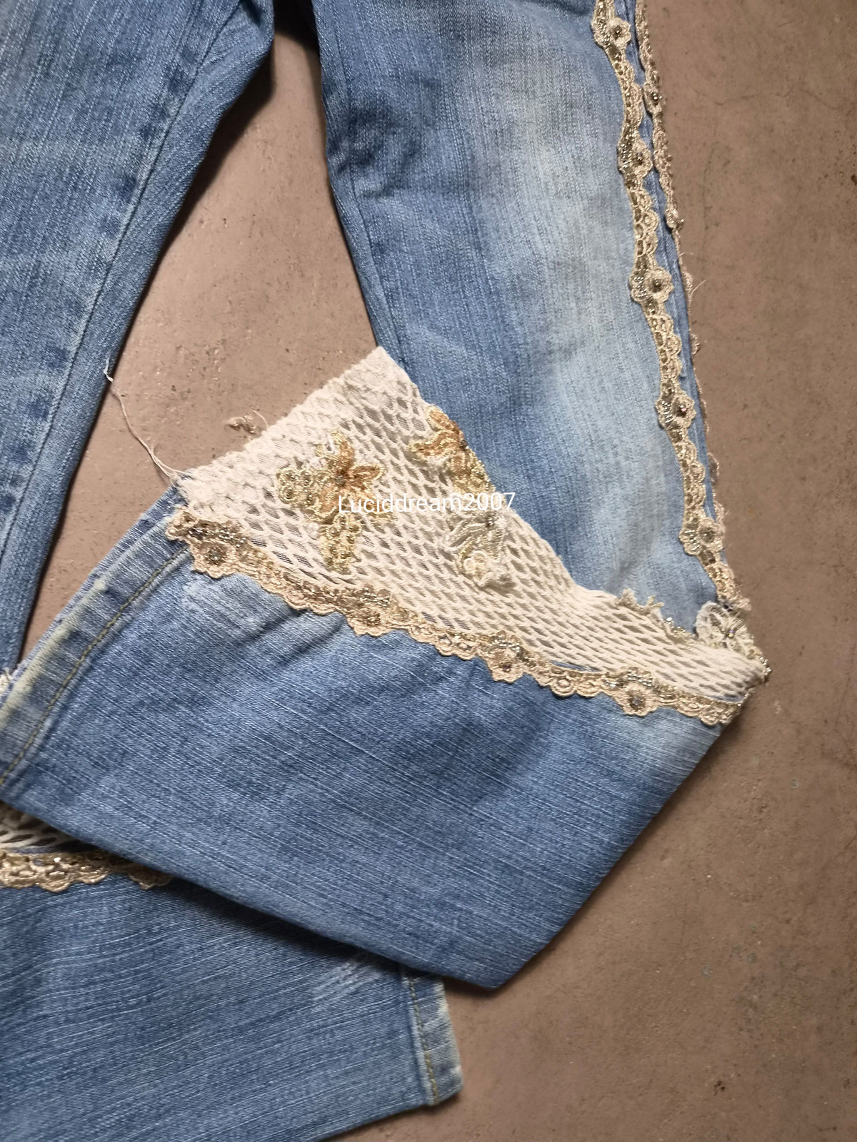 Denim trousers with lace details