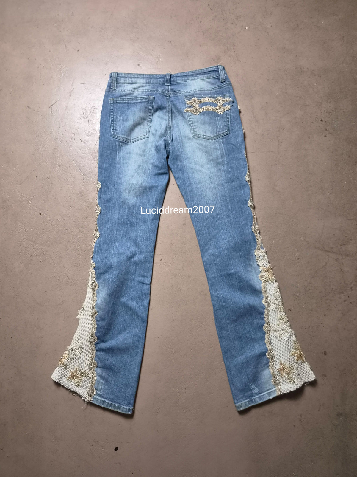 Denim trousers with lace details