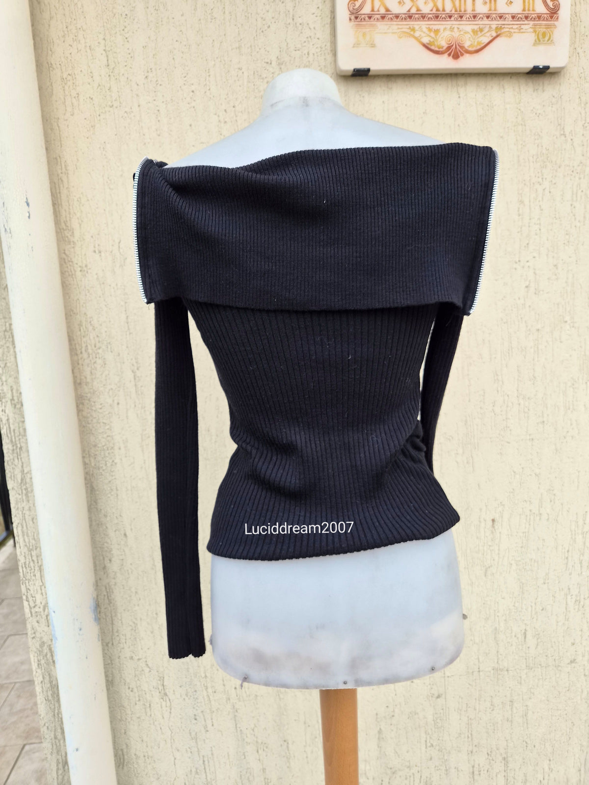 Pull détails boucles et zip