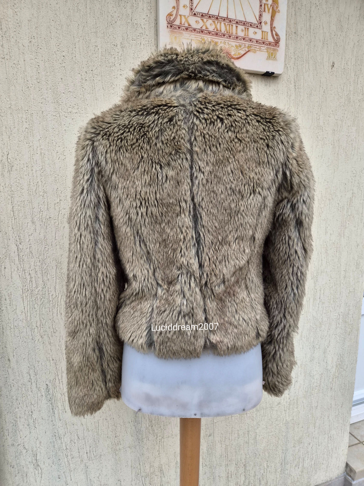 Manteau fausse fourrure beige