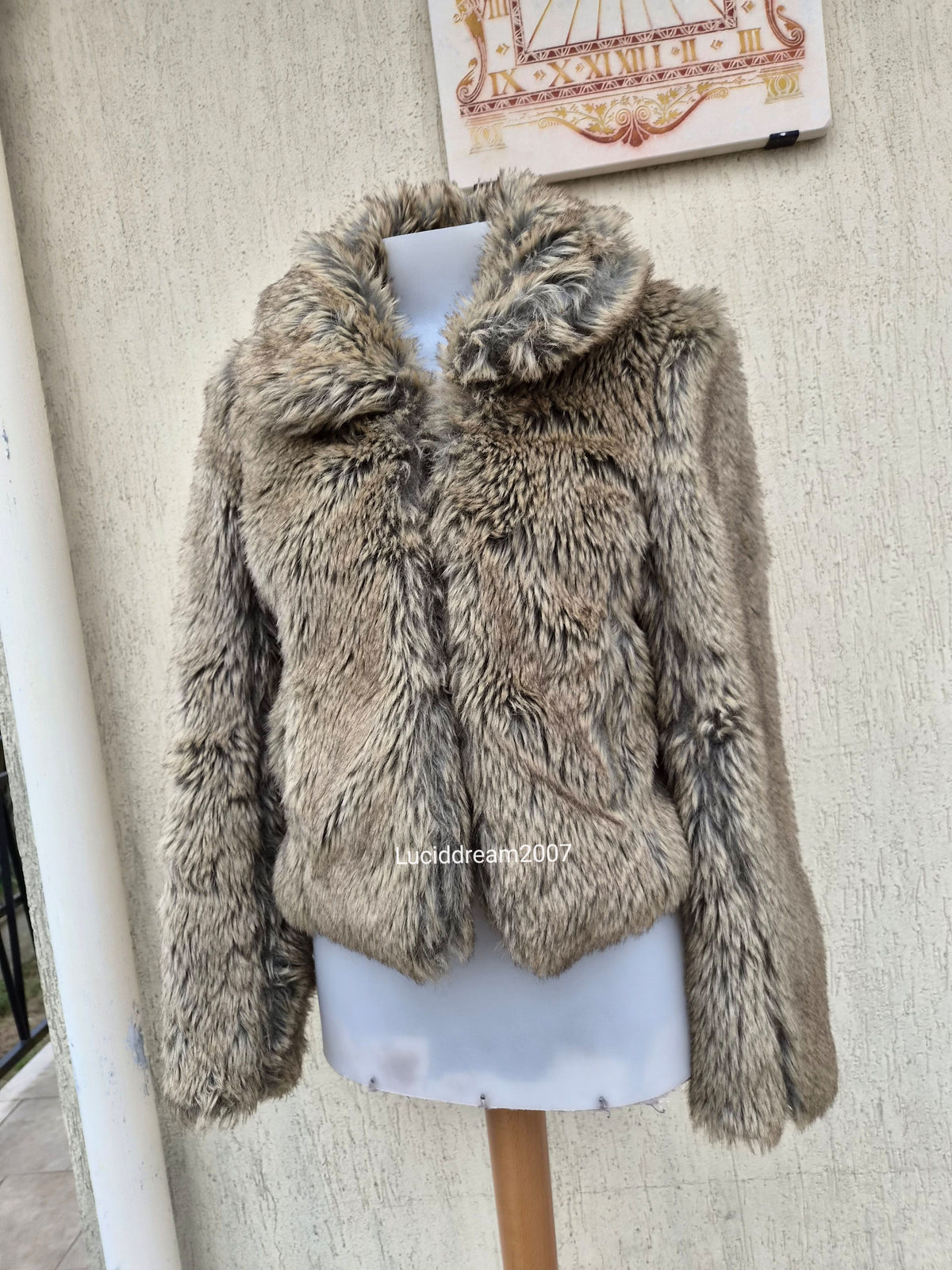 Manteau fausse fourrure beige