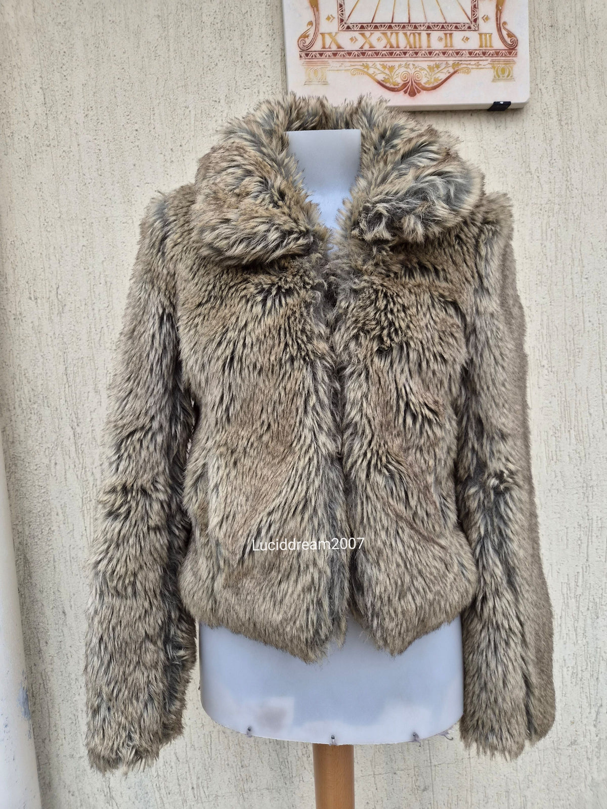 Manteau fausse fourrure beige