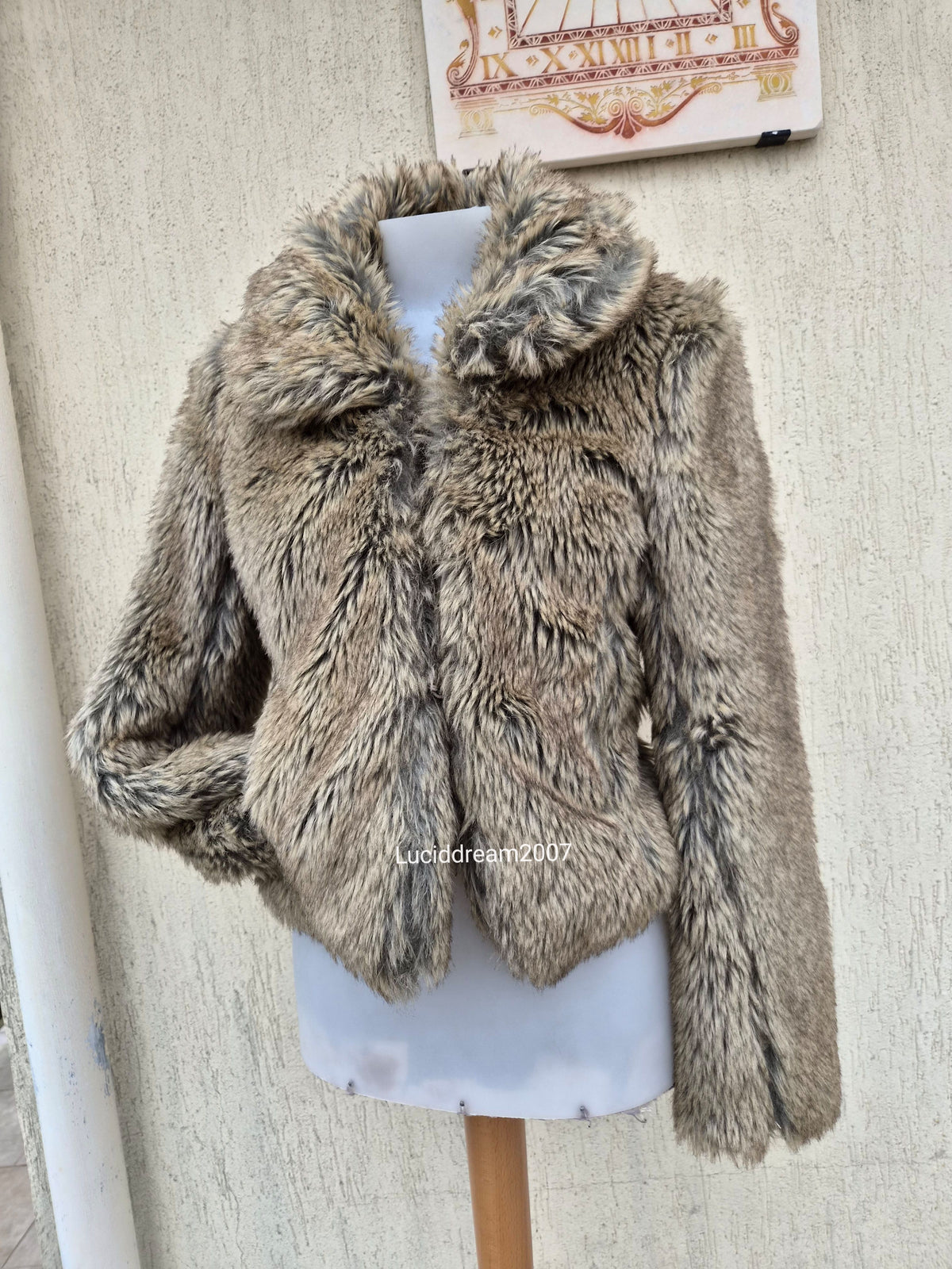 Manteau fausse fourrure beige