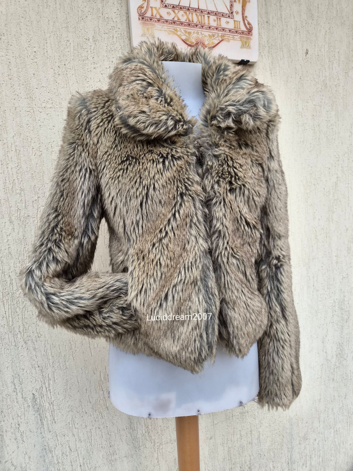 Manteau fausse fourrure beige