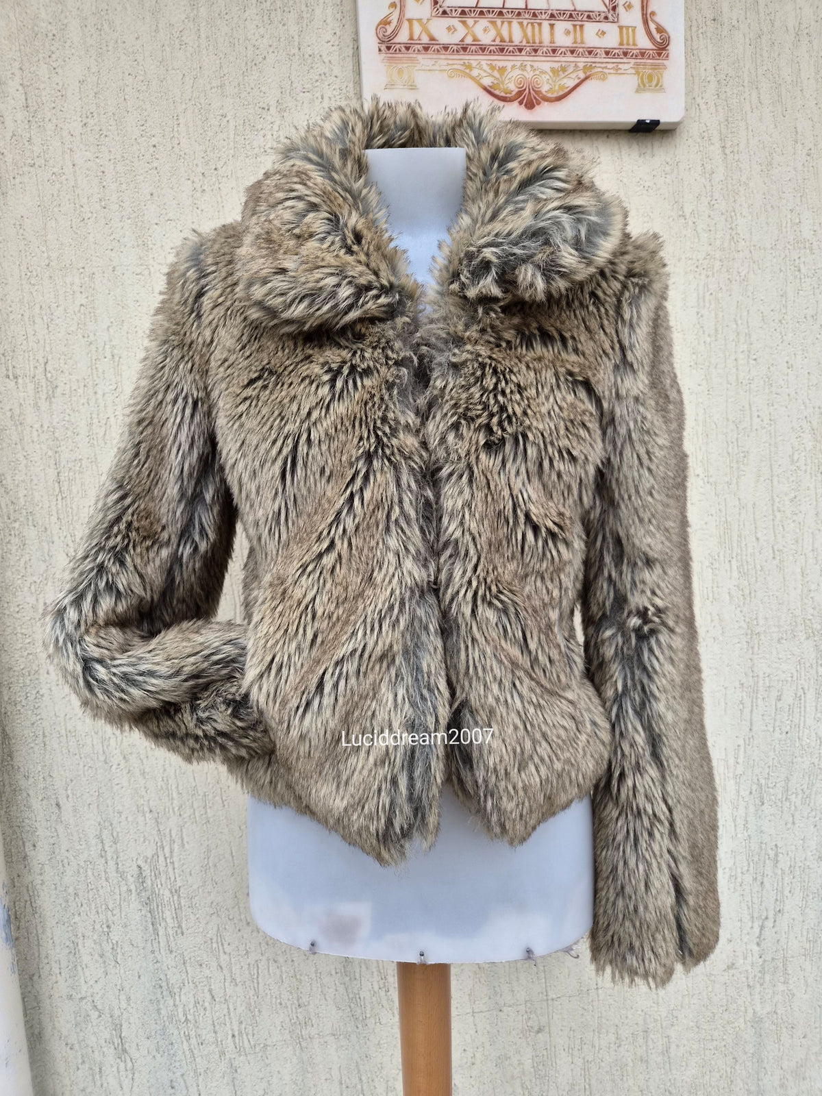 Manteau fausse fourrure beige