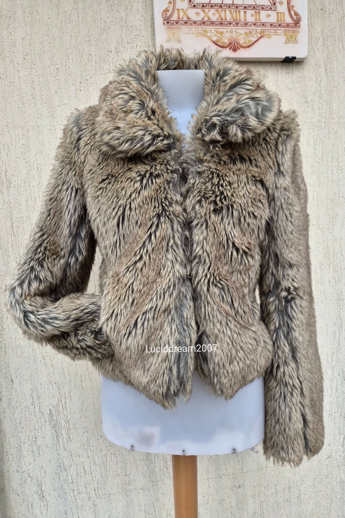 Manteau fausse fourrure beige